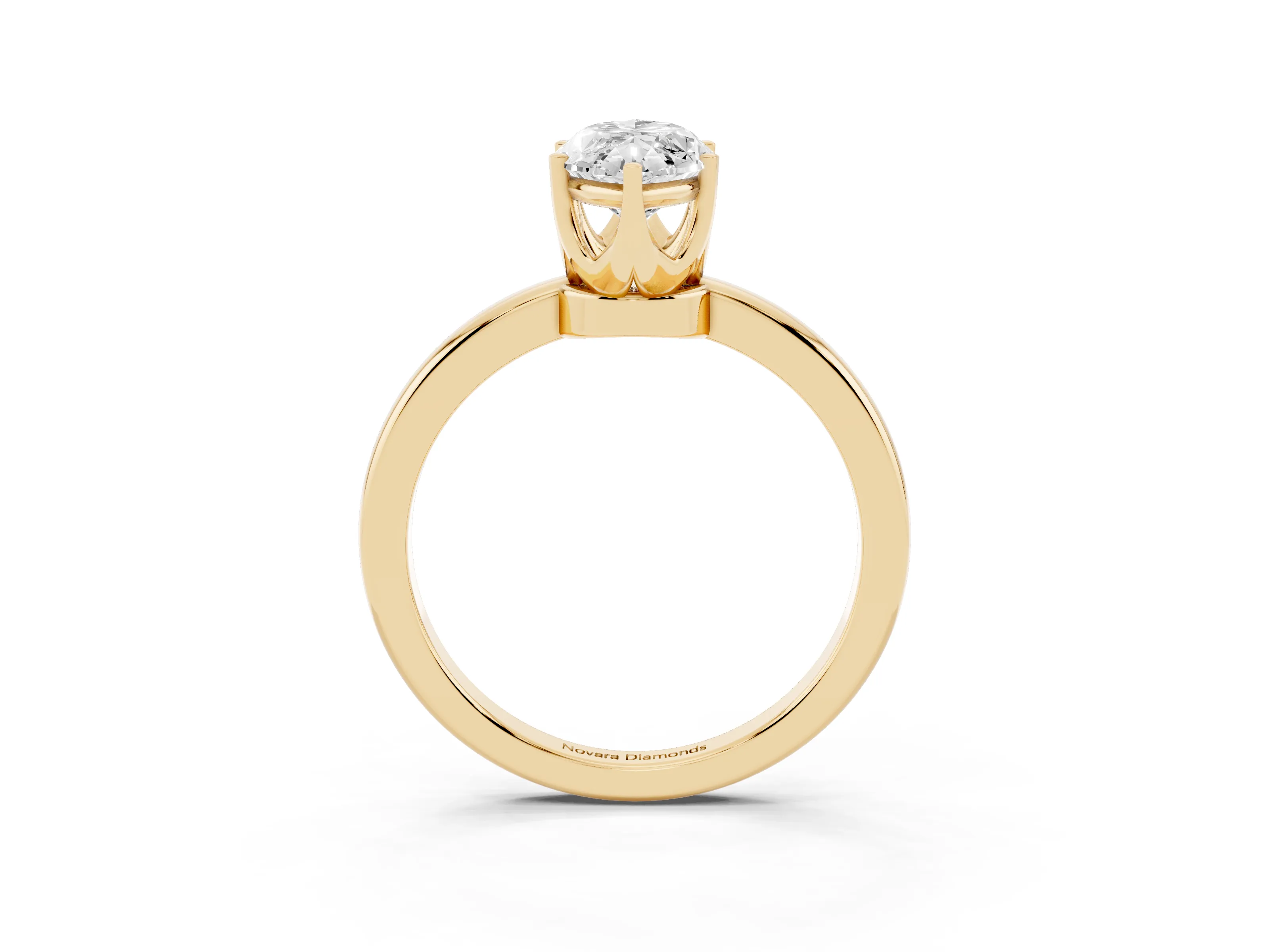 Marquise Cut Diamond Solitaire Ring Set in Yellow gold with Raised Prong Setting on a Classic Band