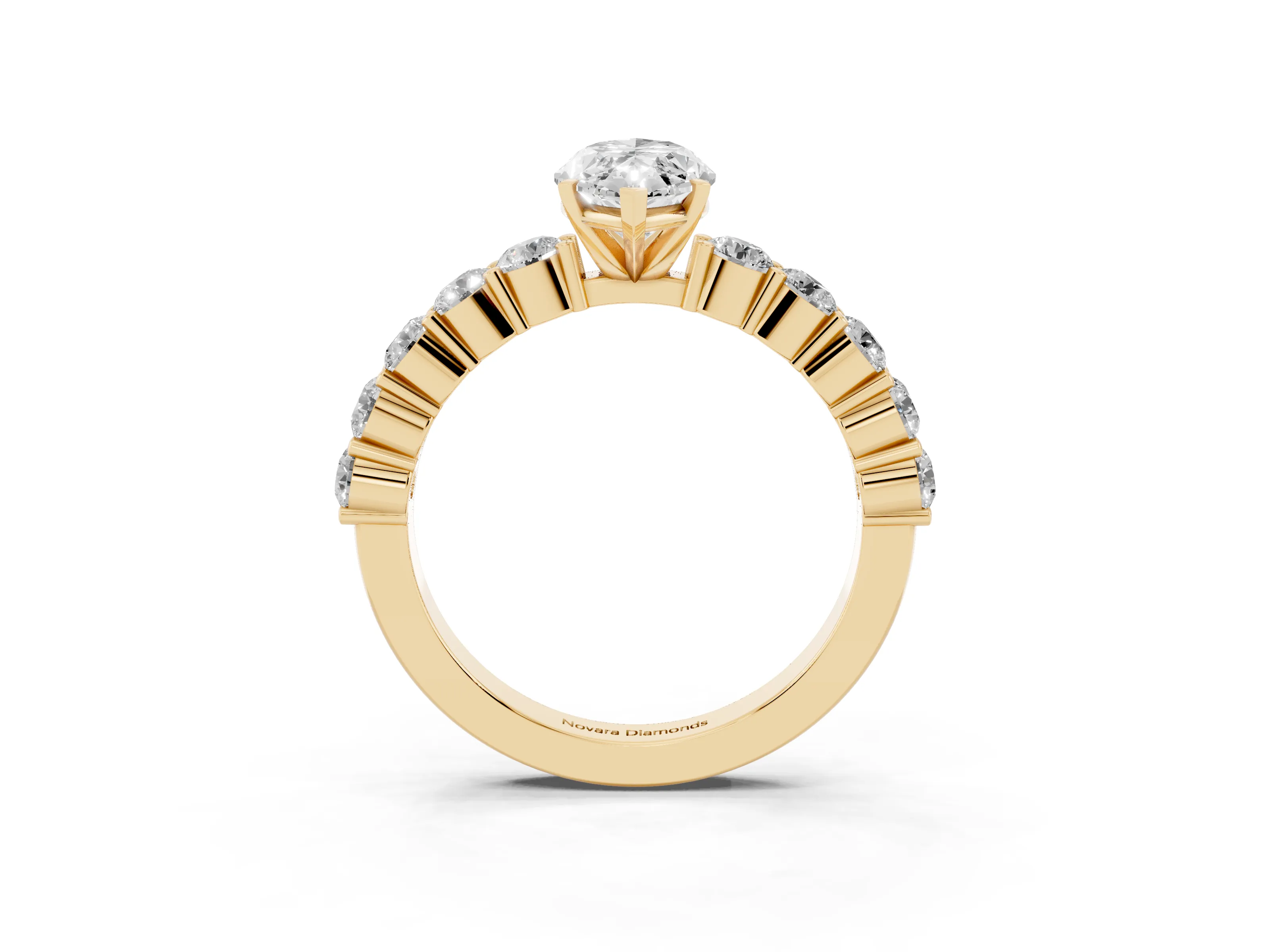 Marquise Cut Diamond Solitaire Ring Set in Yellow gold with Shared Prong Round Side Stones