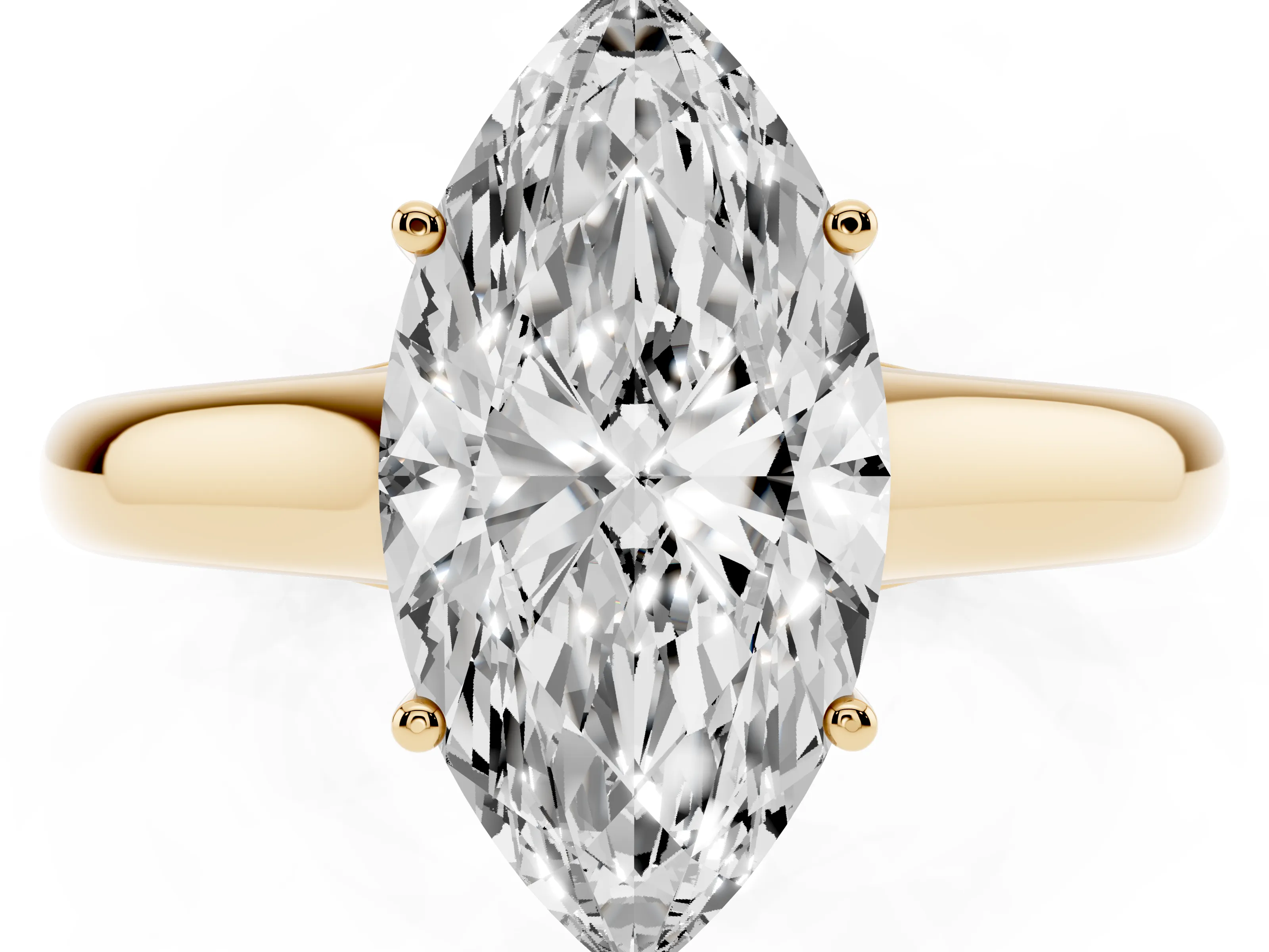 Marquise Cut Diamond Solitaire Engagement Ring Set in Yellow gold with Subtly Tapered Band and Prong Setting
