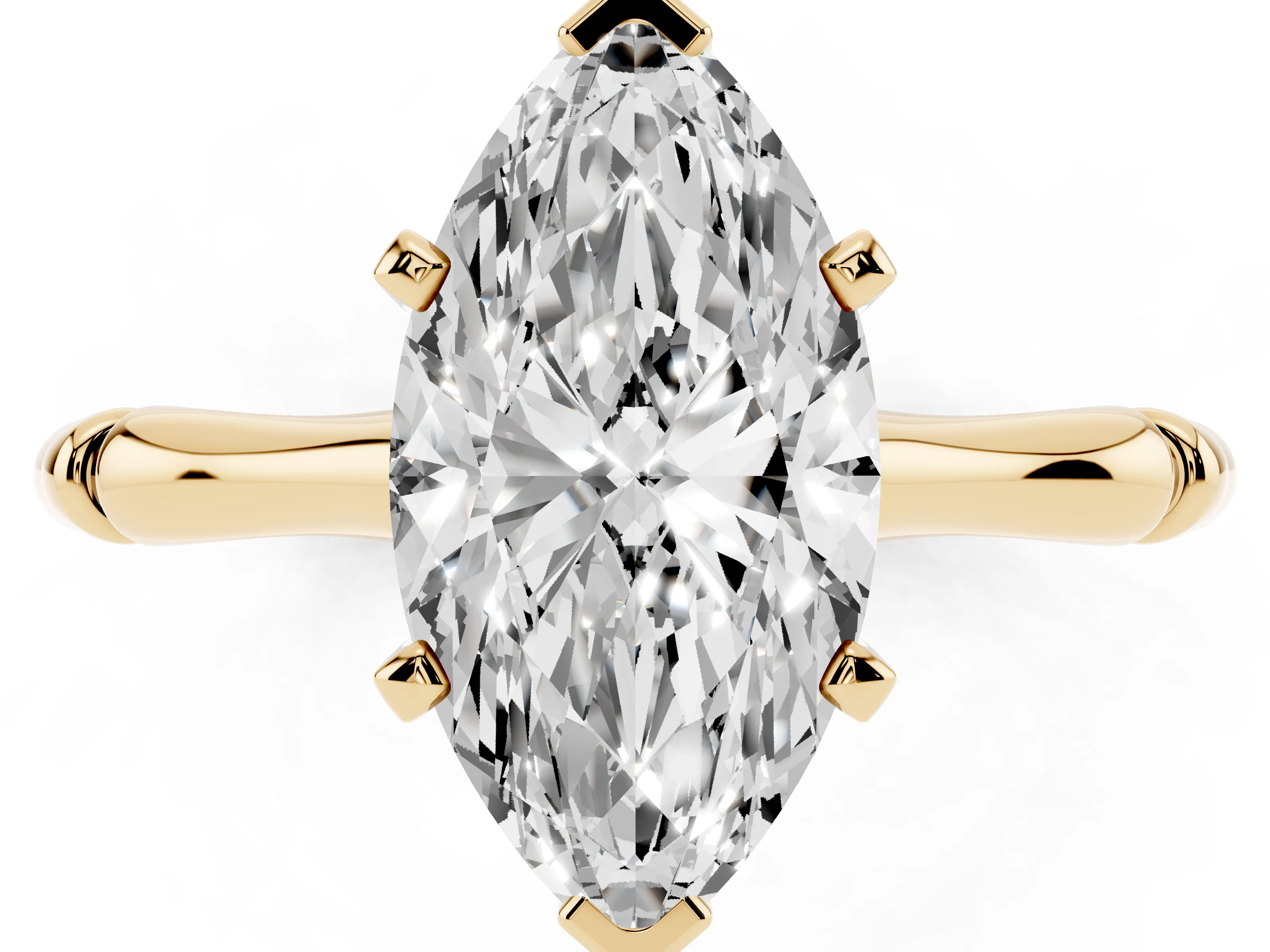 Marquise Cut Diamond Solitaire Ring Set in Yellow gold with Bamboo Band and Prong Setting