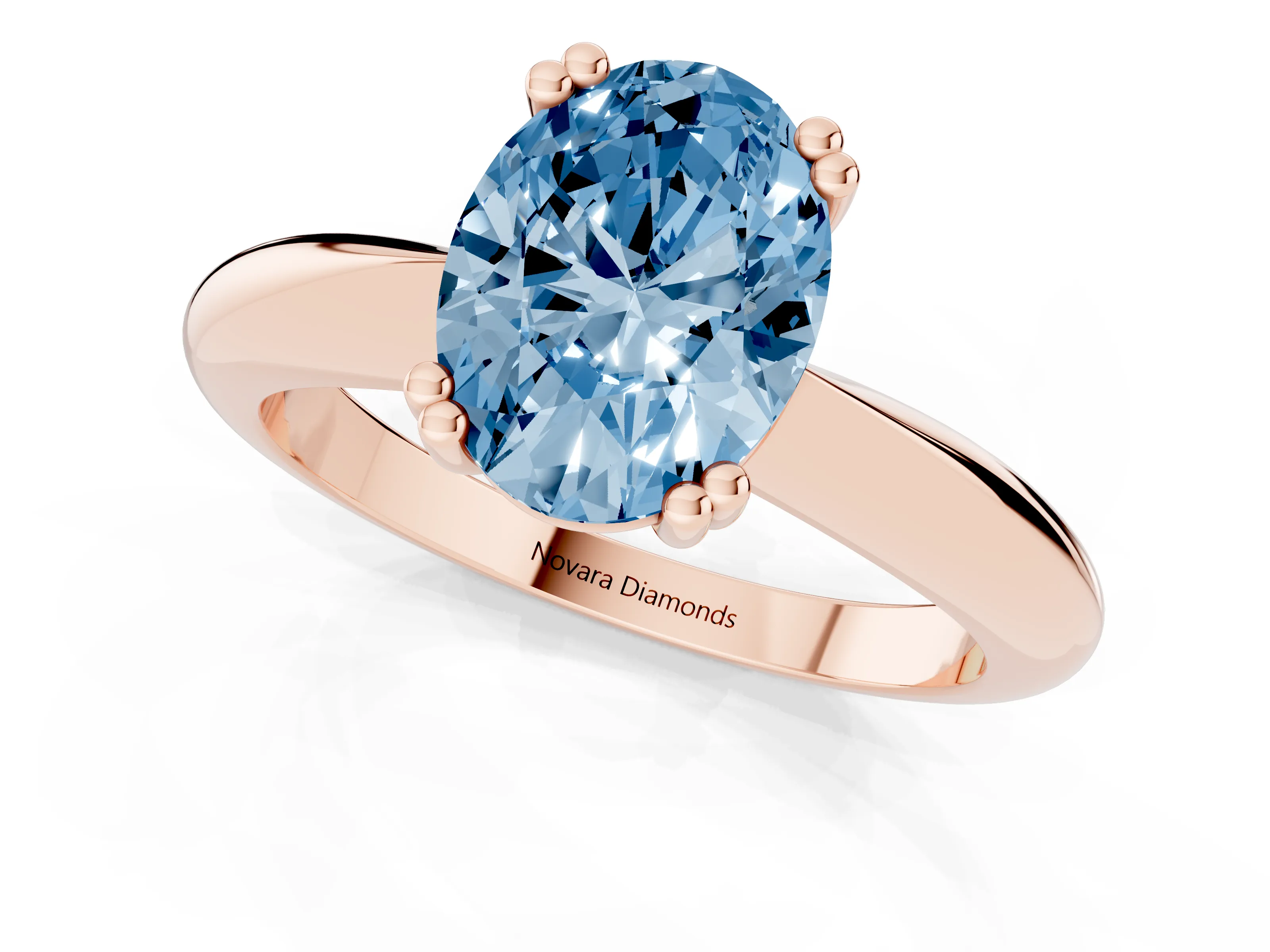 Fancy Blue Oval Cut Diamond Solitaire Engagement Ring Set in Rose gold with Tapered Band and Prong Setting