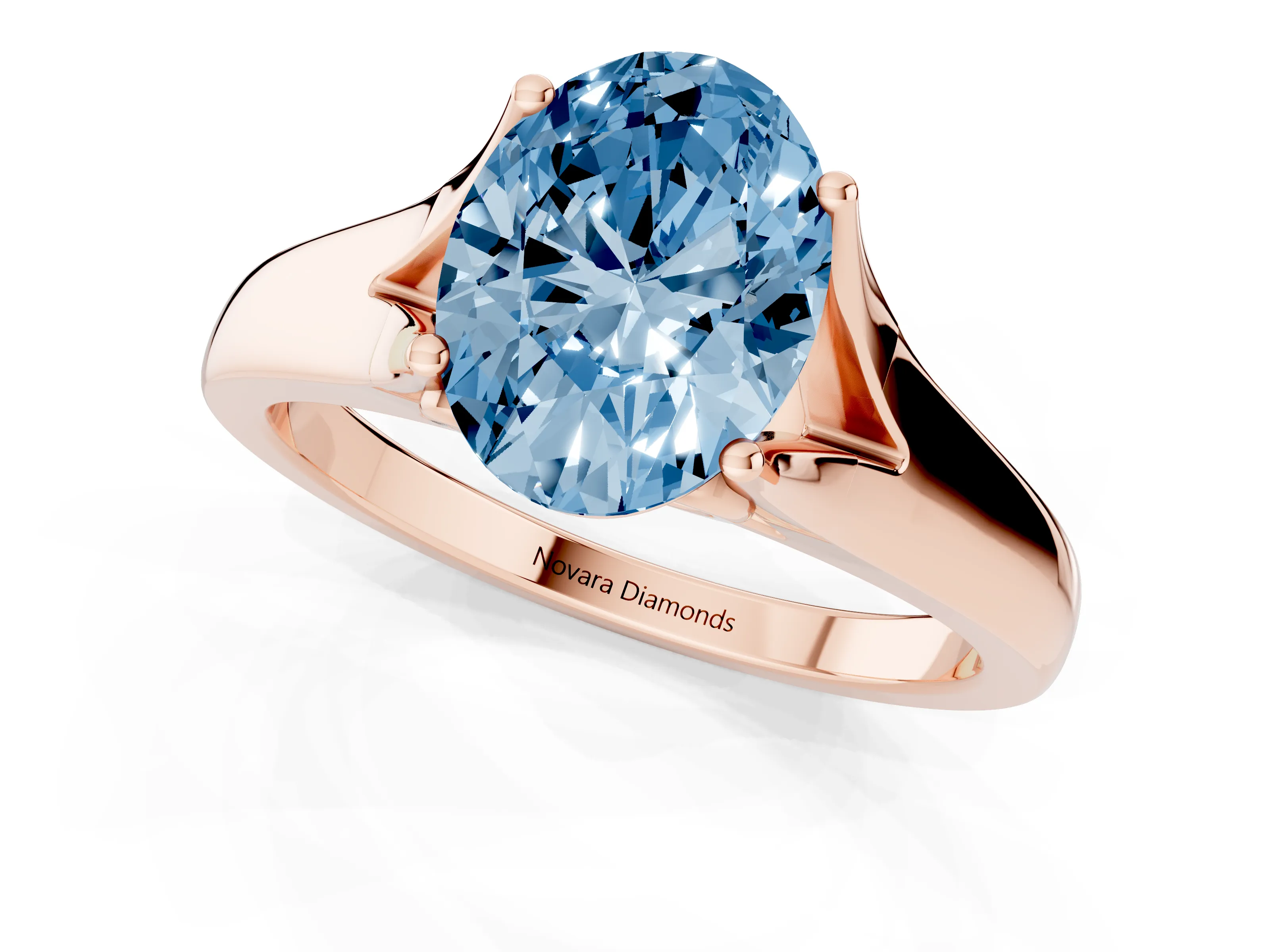 Fancy Blue Oval Cut Diamond Solitaire Ring Set in Rose gold with Arched Cathedral Band and Prong Setting