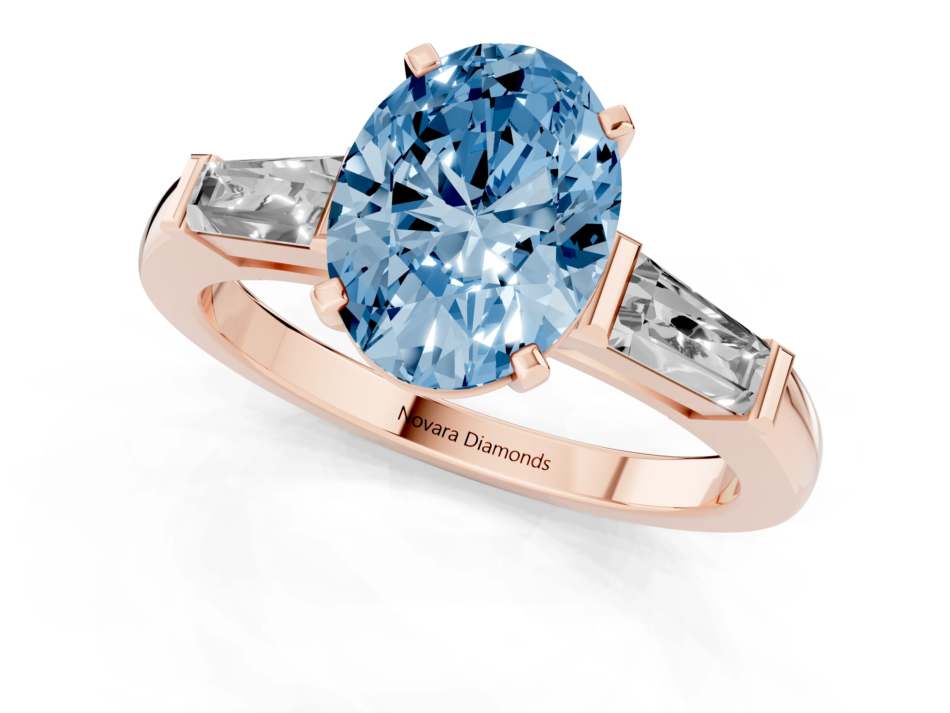 Fancy Blue Oval Cut Diamond Solitaire Ring Set in Rose gold with Tapered Baguette Side Stones and Prong Setting