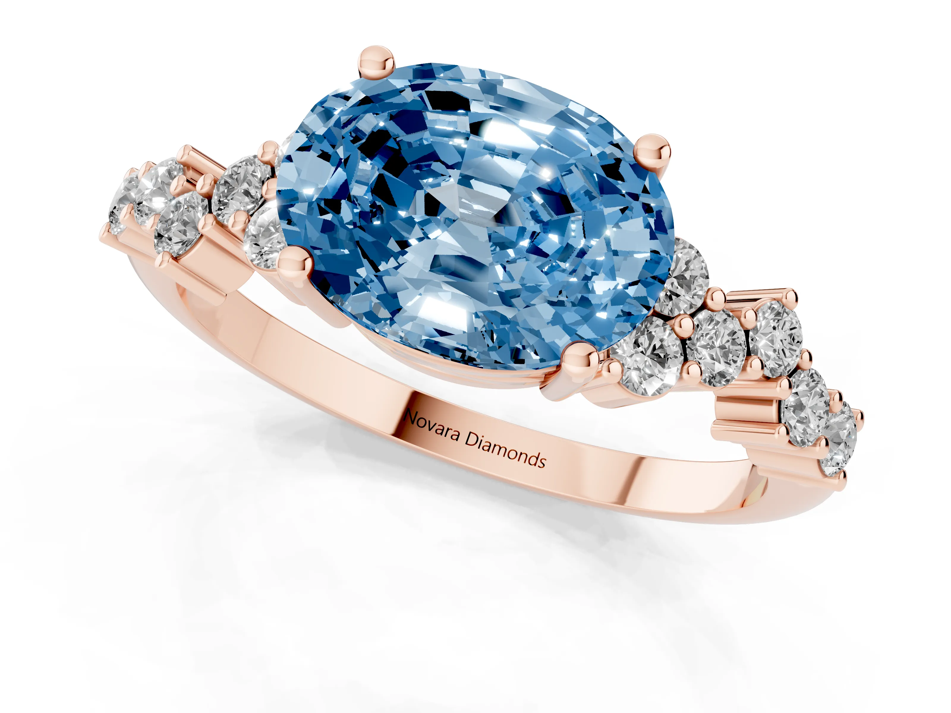 Fancy Blue Oval Cut Diamond Ring Set in Rose gold with Scattered Round Accents