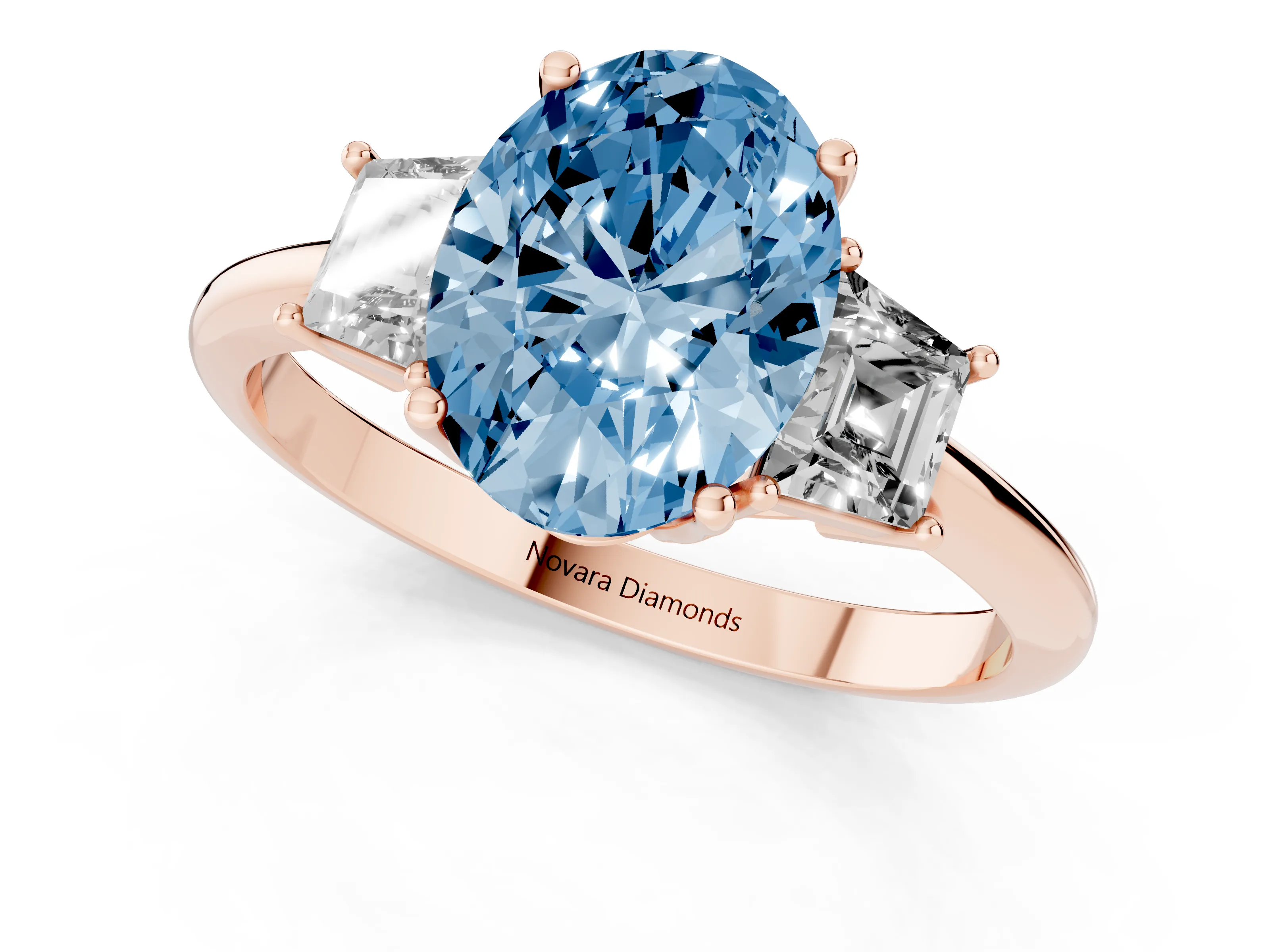 Fancy Blue Oval Cut Diamond Three-Stone Ring Set in Rose gold with Trapezoid Side Stones and Prong Setting