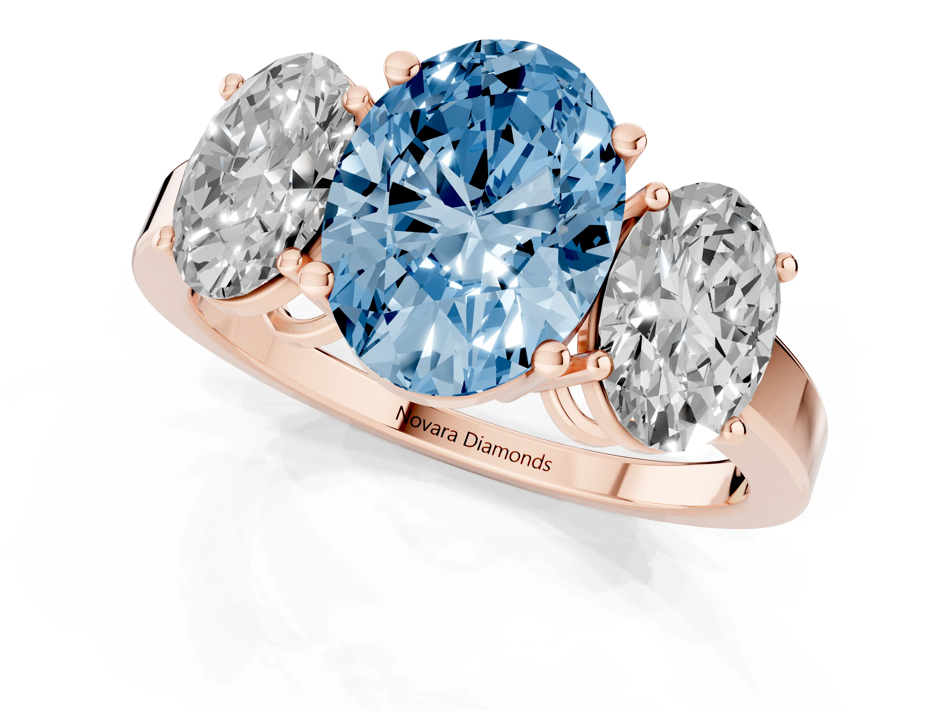 Fancy Blue Oval Cut Diamond Three-Stone Engagement Ring Set in Rose gold with Flat Band