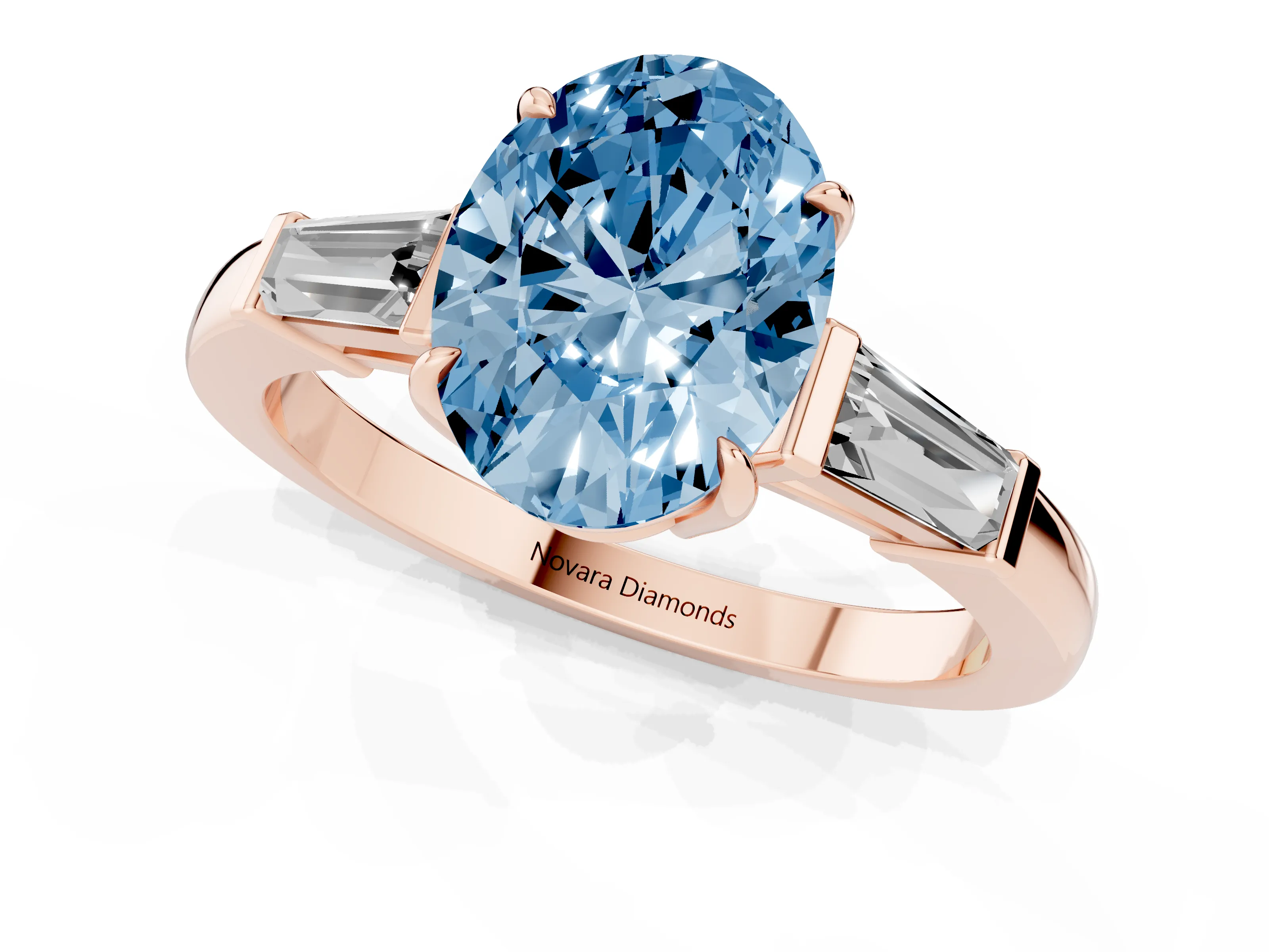 Fancy Blue Oval Cut Diamond Three-Stone Ring Set in Rose gold with Tapered Baguette Side Stones and Prong Setting