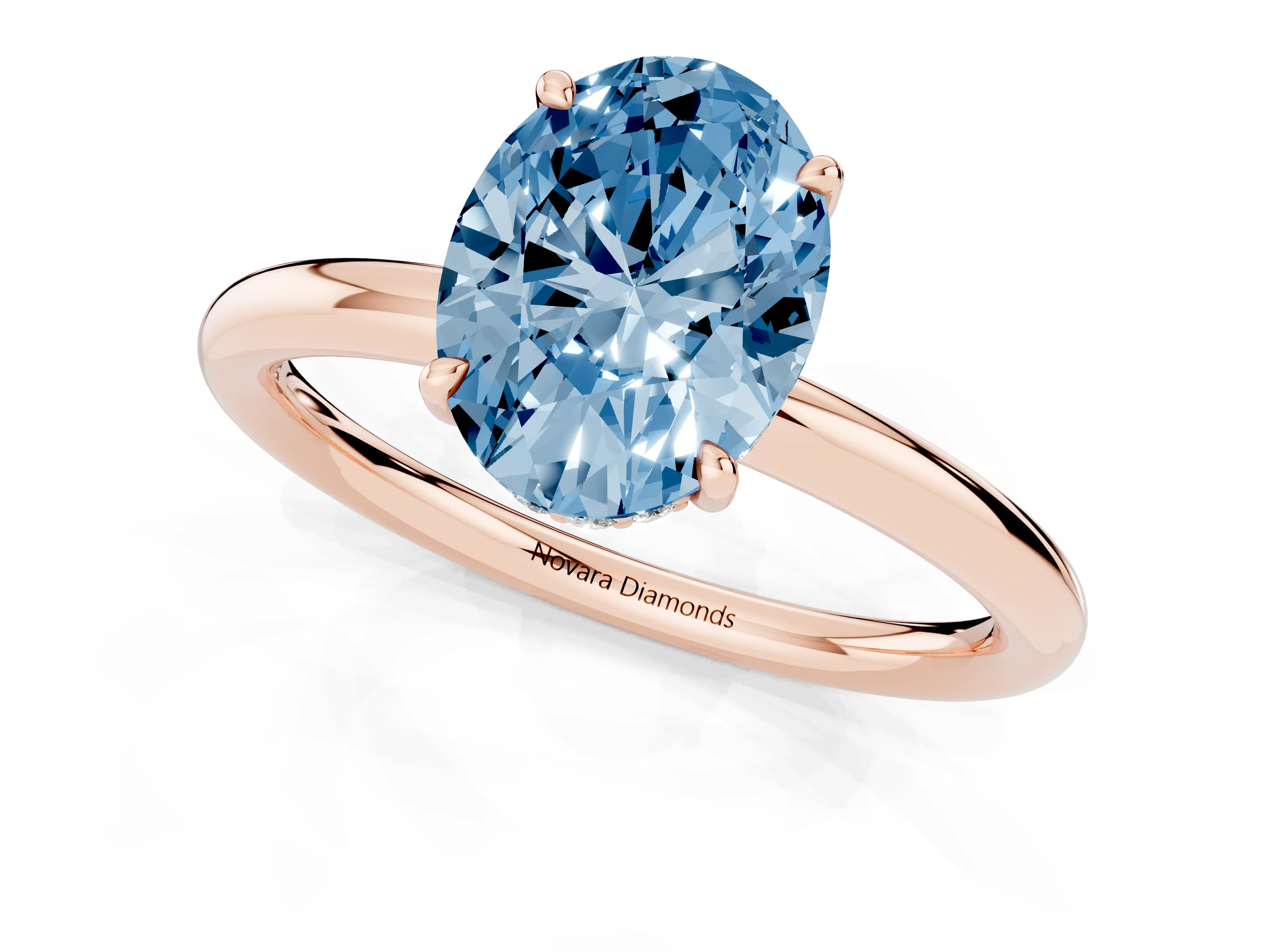 Fancy Blue Oval Cut Diamond Solitaire Ring Set in Rose gold with Thin Band and Prong Setting