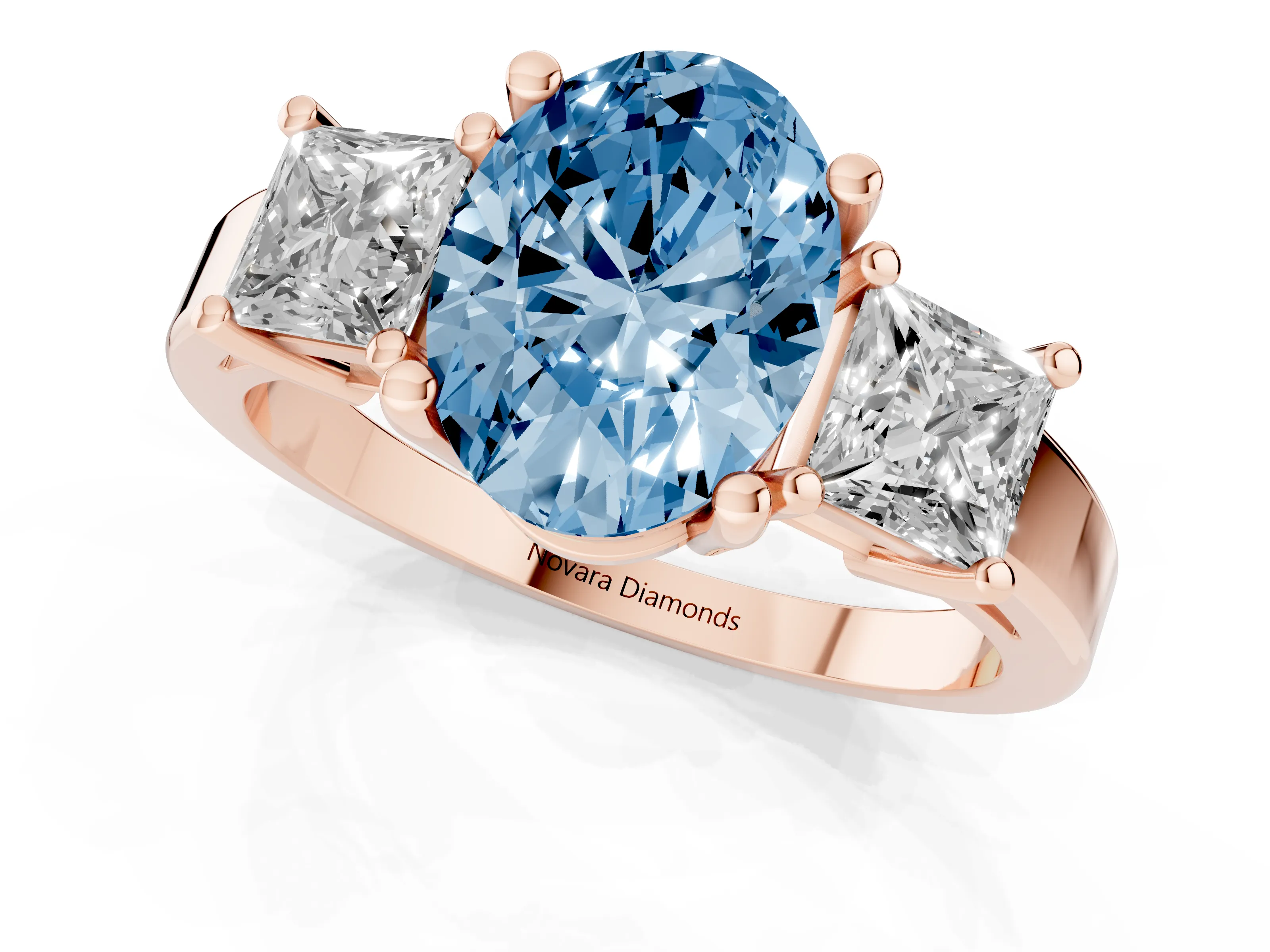 Fancy Blue Three-Stone Oval Cut Diamond Solitaire Ring Set in Rose gold with Prong Setting