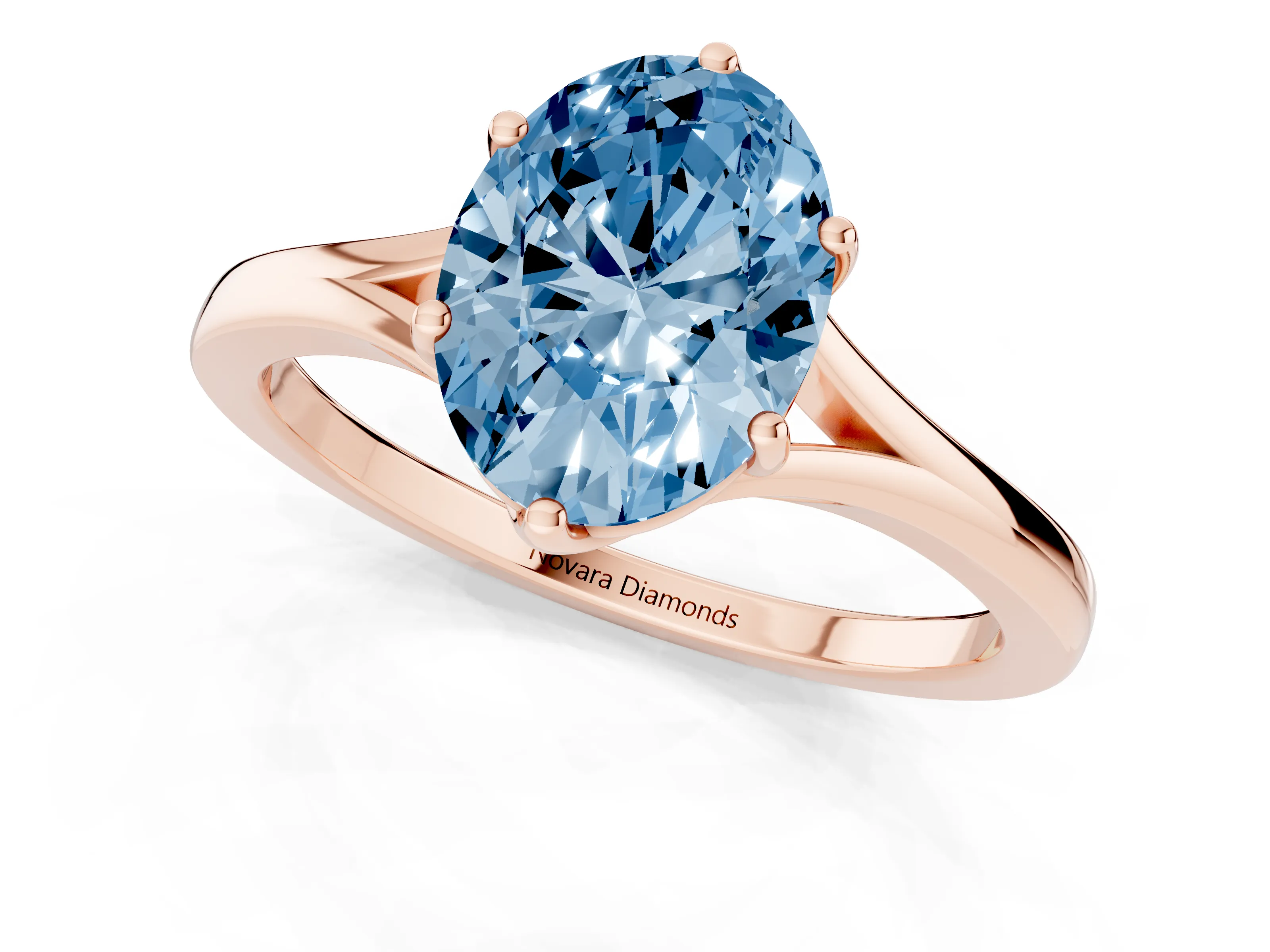 Fancy Blue Oval Cut Diamond Solitaire Ring Set in Rose gold with Polished Tapered Band and Prong Setting
