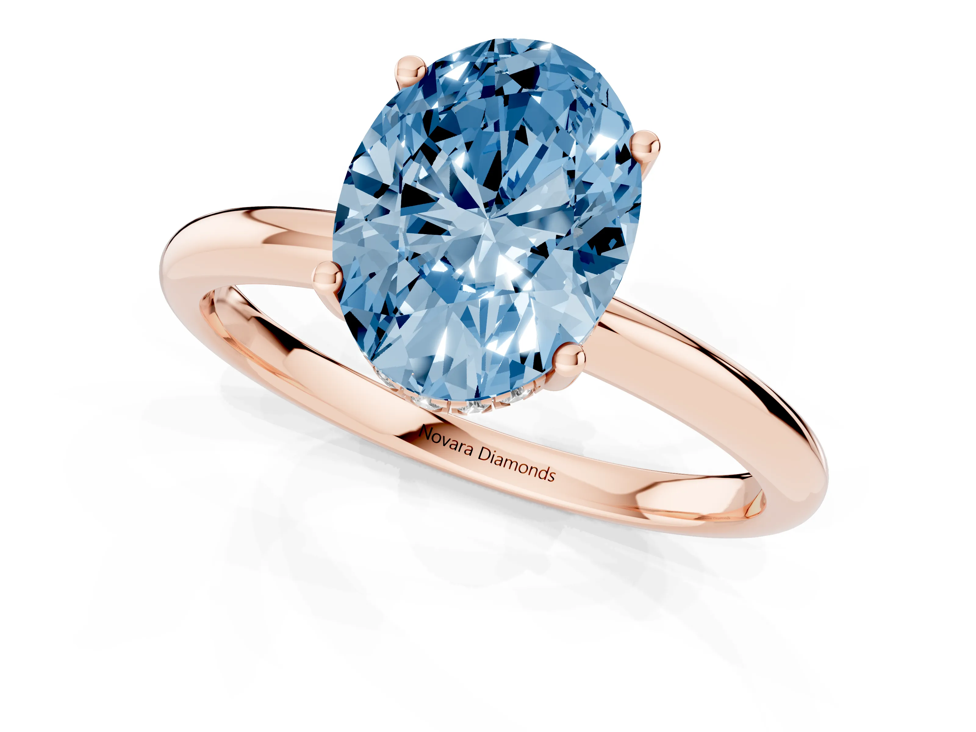 Fancy Blue Oval Cut Diamond Solitaire Engagement Ring Set in Rose gold with Prong Setting and Polished Band