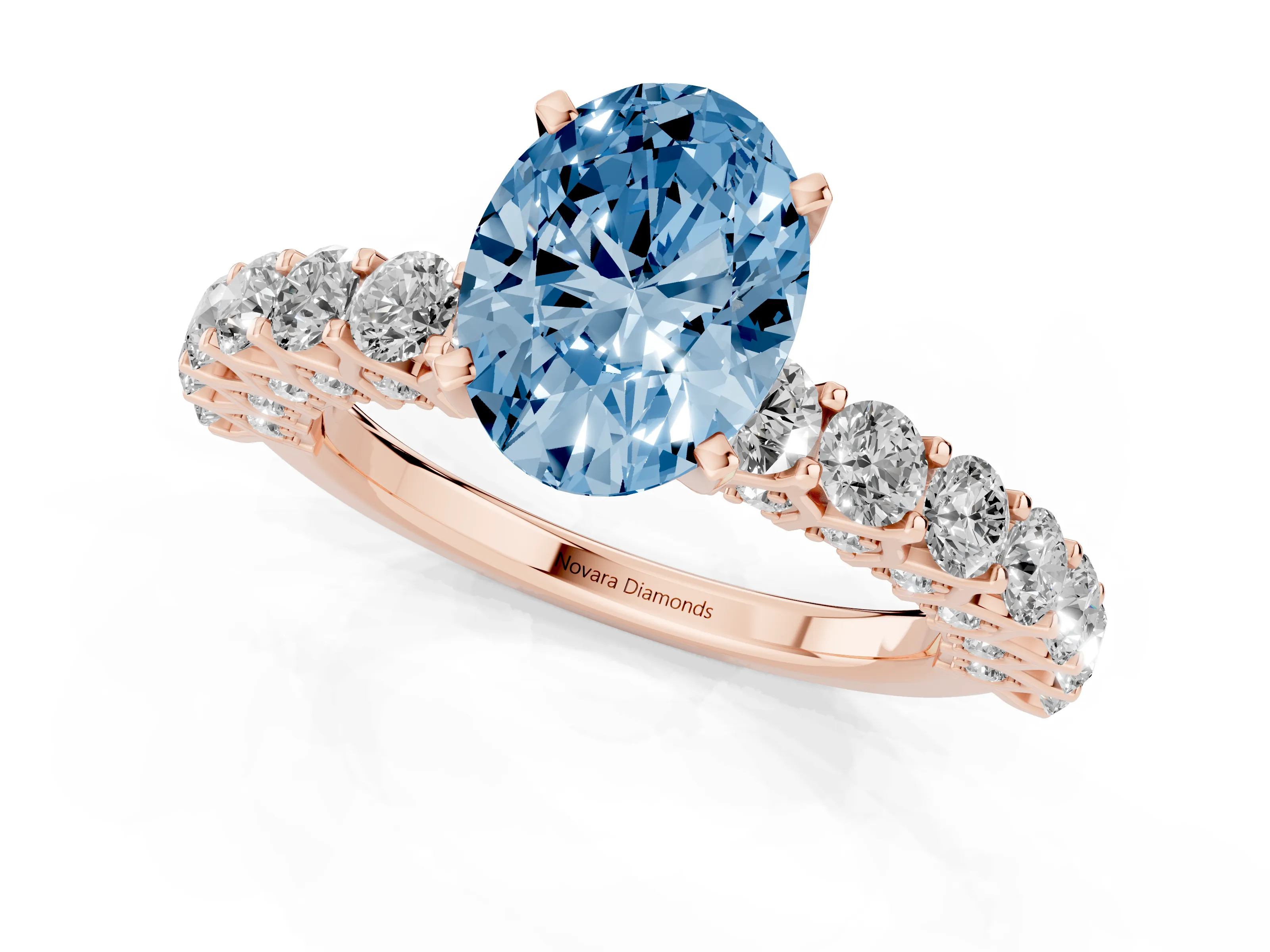 Fancy Blue Oval Cut Diamond Solitaire Ring Set in Rose gold with Shared Prong Pavé Band