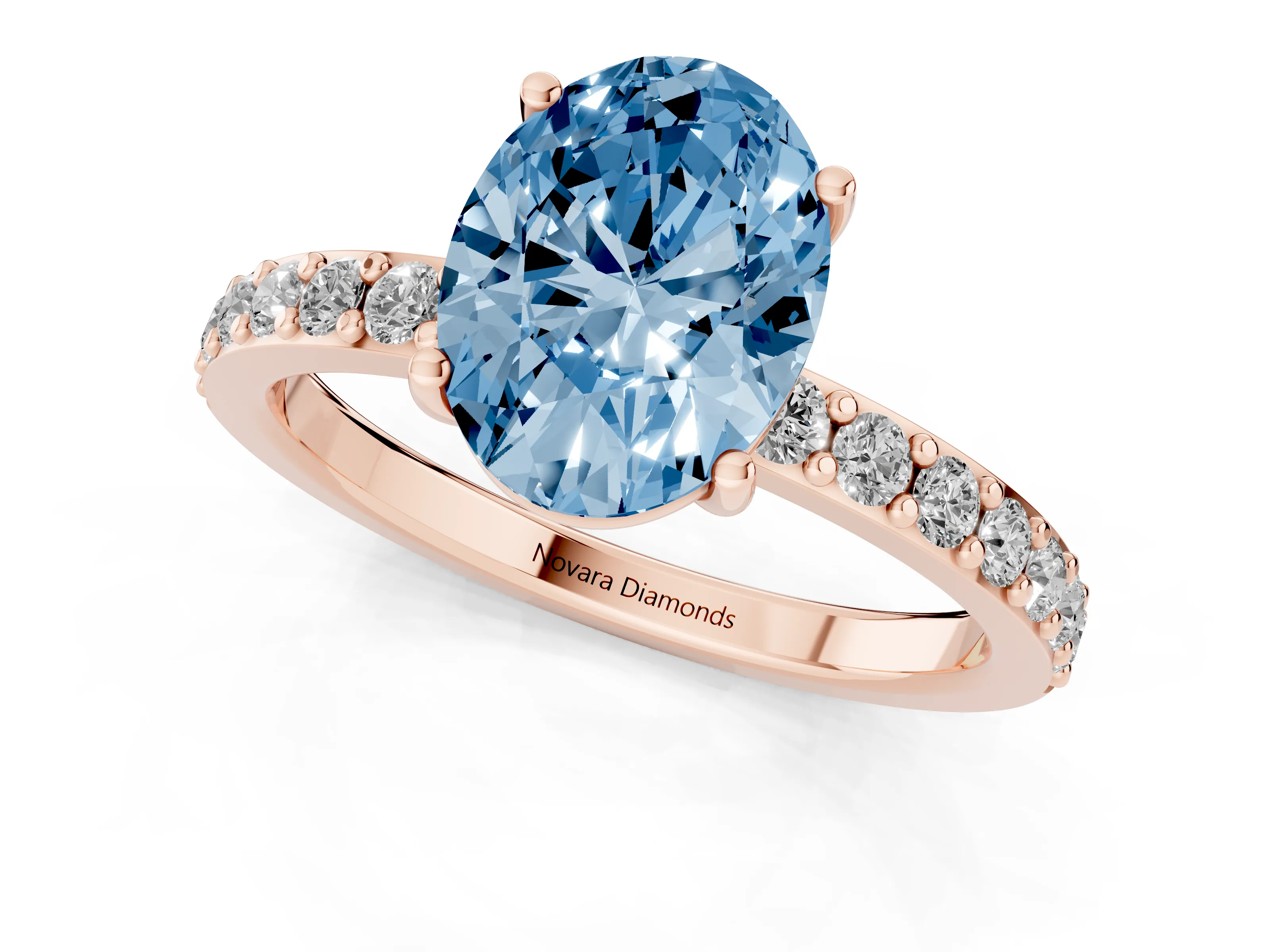 Fancy Blue Oval Cut Diamond Solitaire Set in Rose gold with Round Pavé Band and Prong Setting