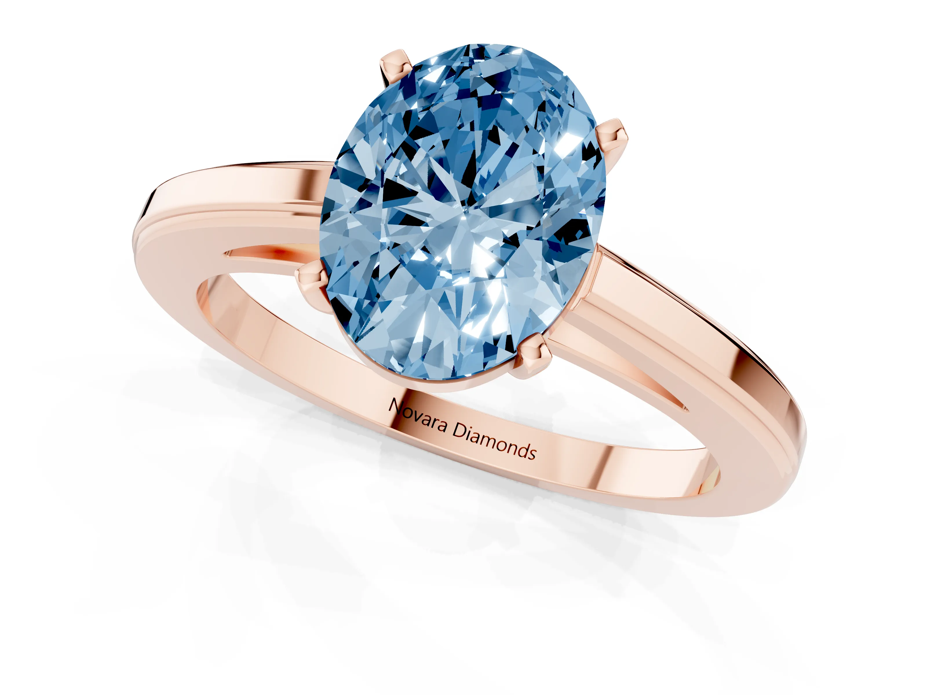 Fancy Blue Oval Cut Diamond Solitaire Ring Set in Rose gold with Prong Setting and Classic Band