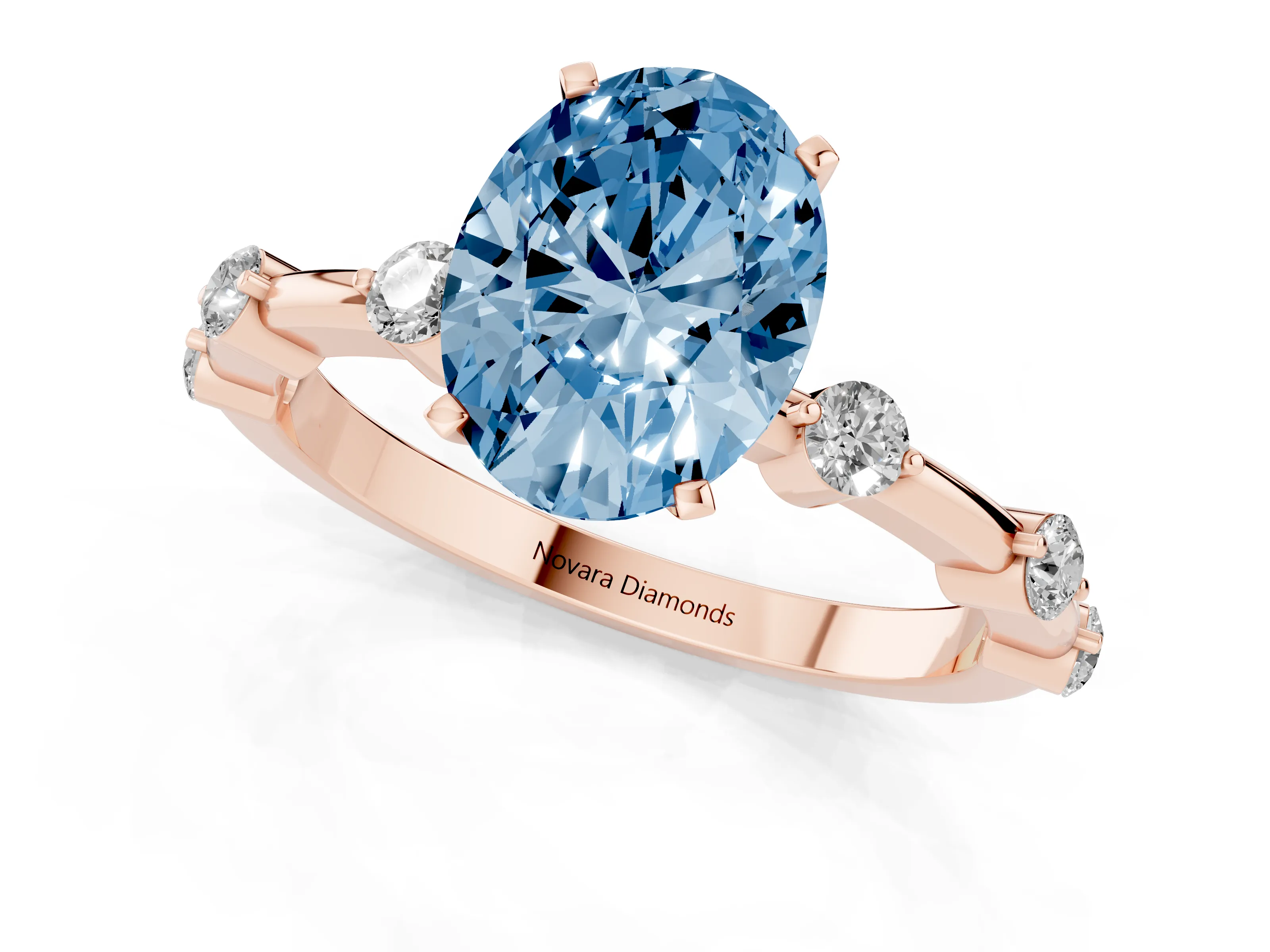 Fancy Blue Oval Cut Diamond Solitaire Ring Set in Rose gold with Bezel Set Side Stones and Prong Setting