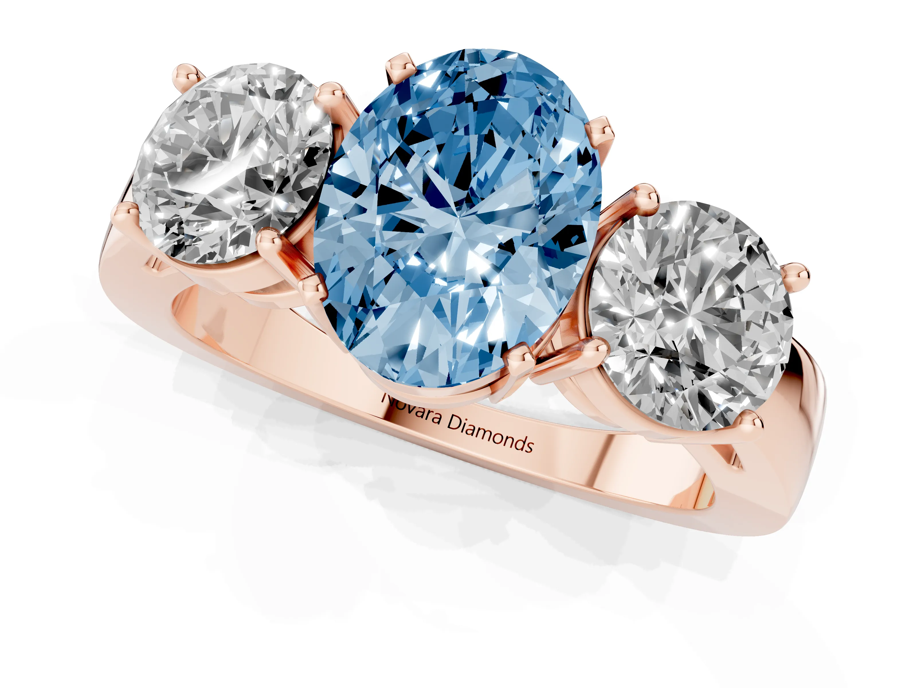 Fancy Blue Oval Cut Diamond Three-Stone Ring Set in Rose gold with Round Side Stones and Classic Band