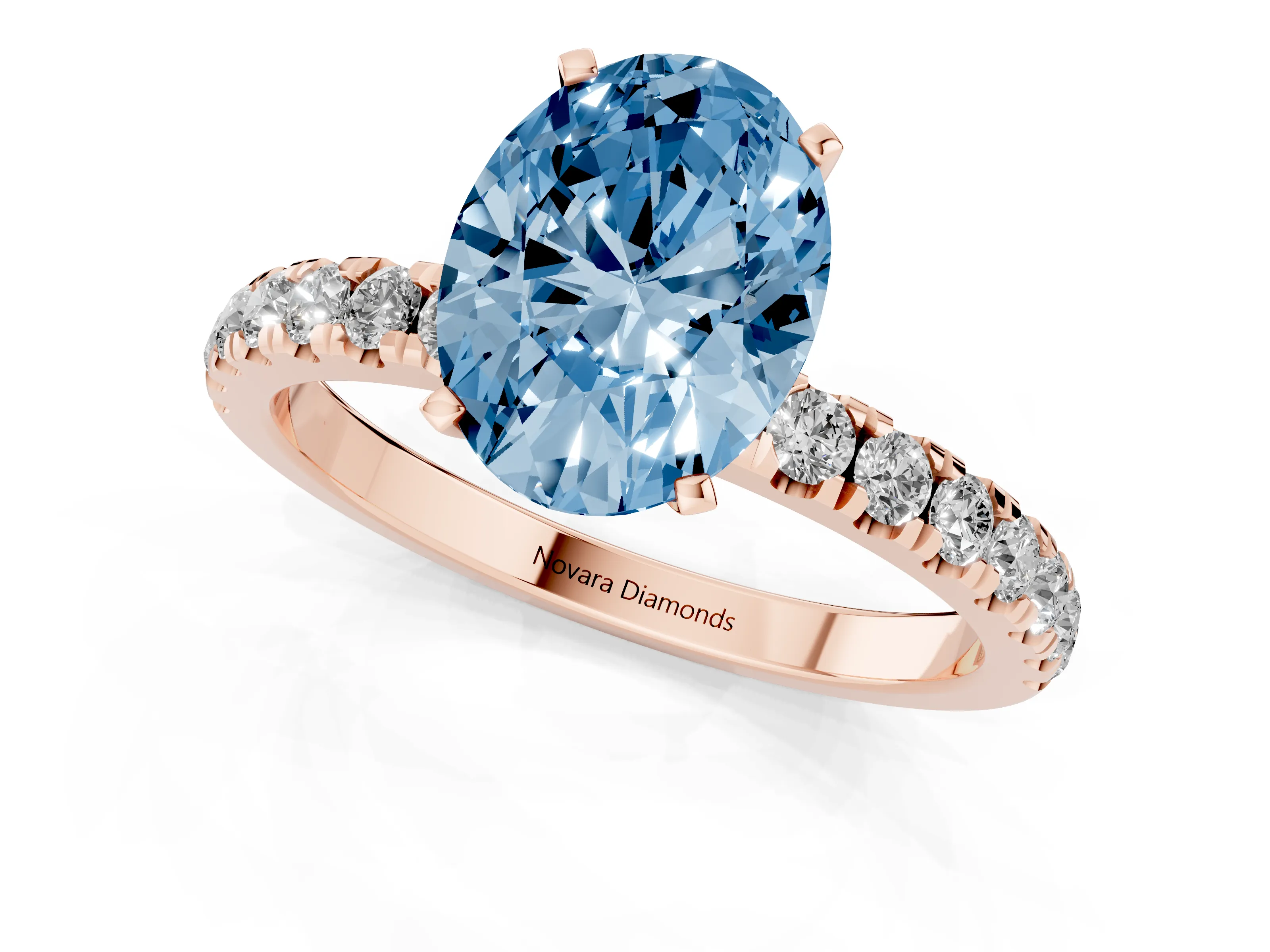 Fancy Blue Oval Cut Diamond Solitaire Ring Set in Rose gold with Pavé Accents and Prong Setting