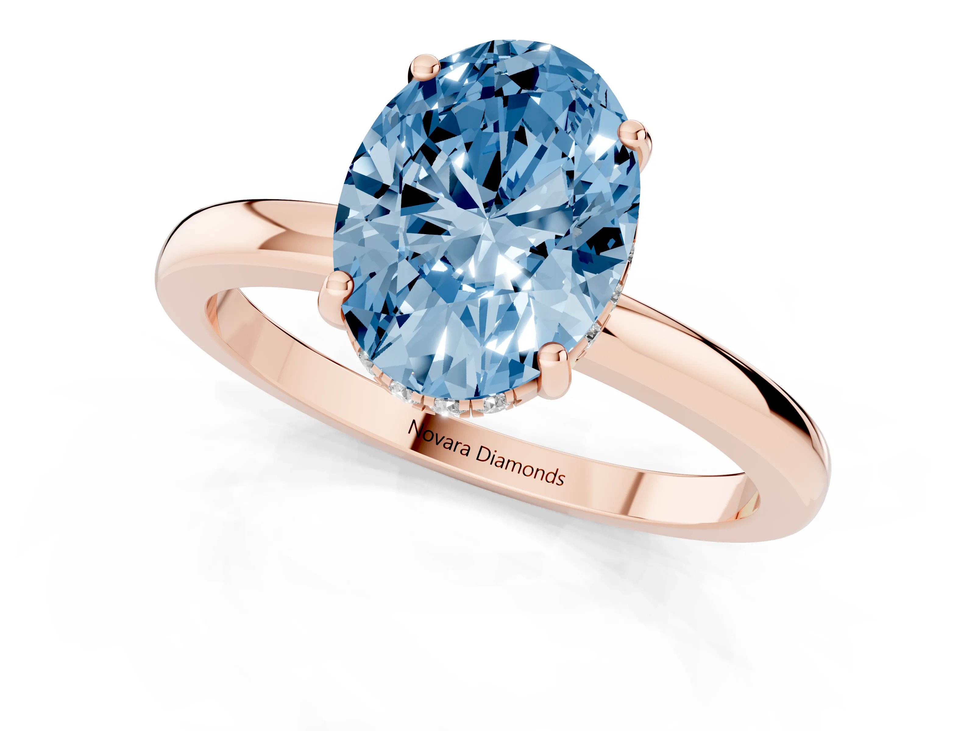 Fancy Blue Oval Cut Diamond Solitaire Ring Set in Rose gold with Plain Band and Prong Setting