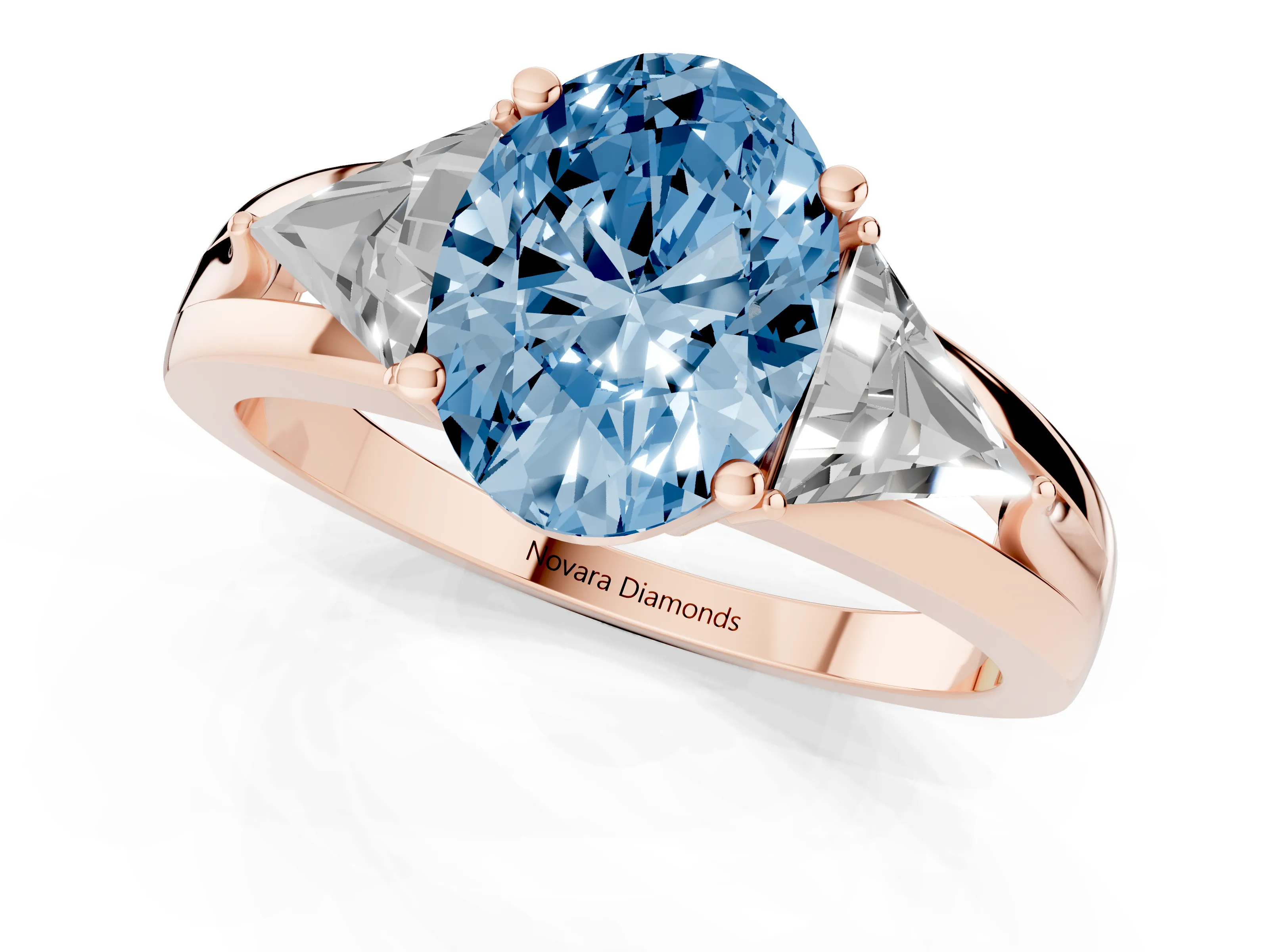 Fancy Blue Oval Cut Diamond Three-Stone Ring Set in Rose gold with Trillion Side Stones and Split Shank