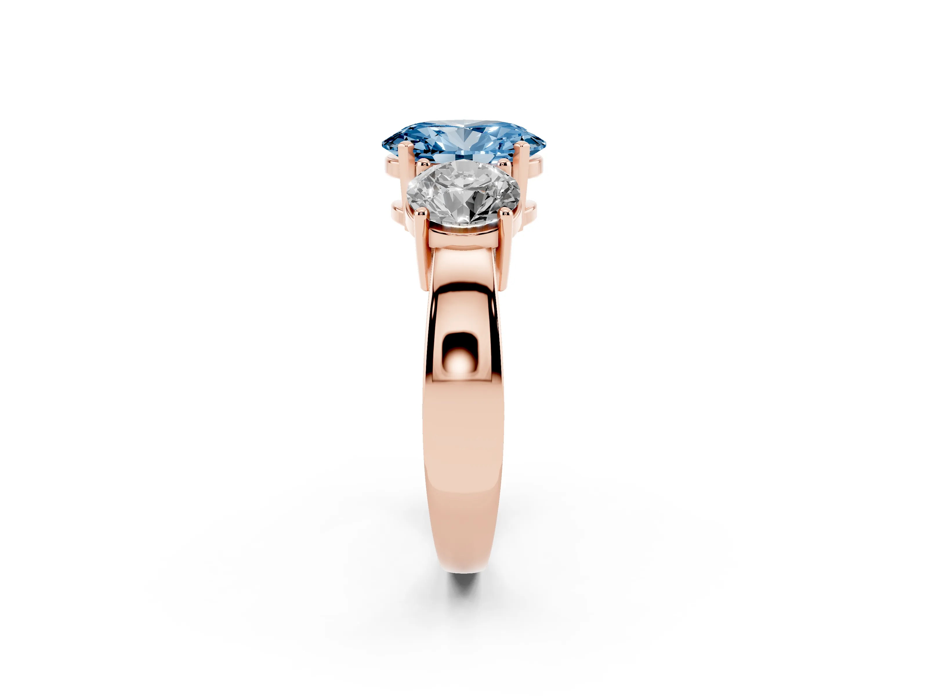 Fancy Blue Oval Cut Diamond Three-Stone Ring Set in Rose gold with Round Side Stones and Classic Band