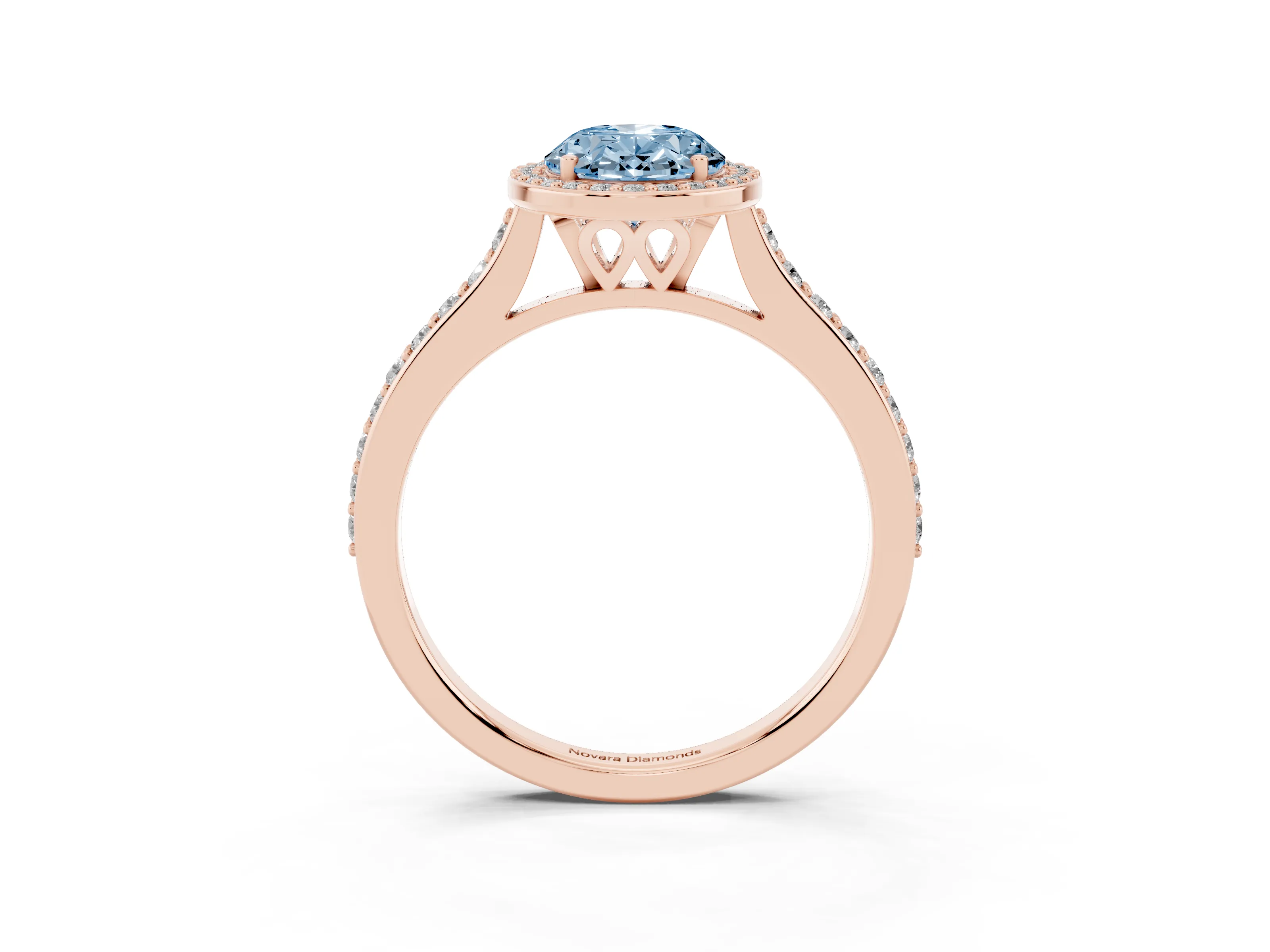 Fancy Blue Oval Cut Diamond Halo Engagement Ring Set in Rose gold with Round Pavé Shoulders and Heart Gallery
