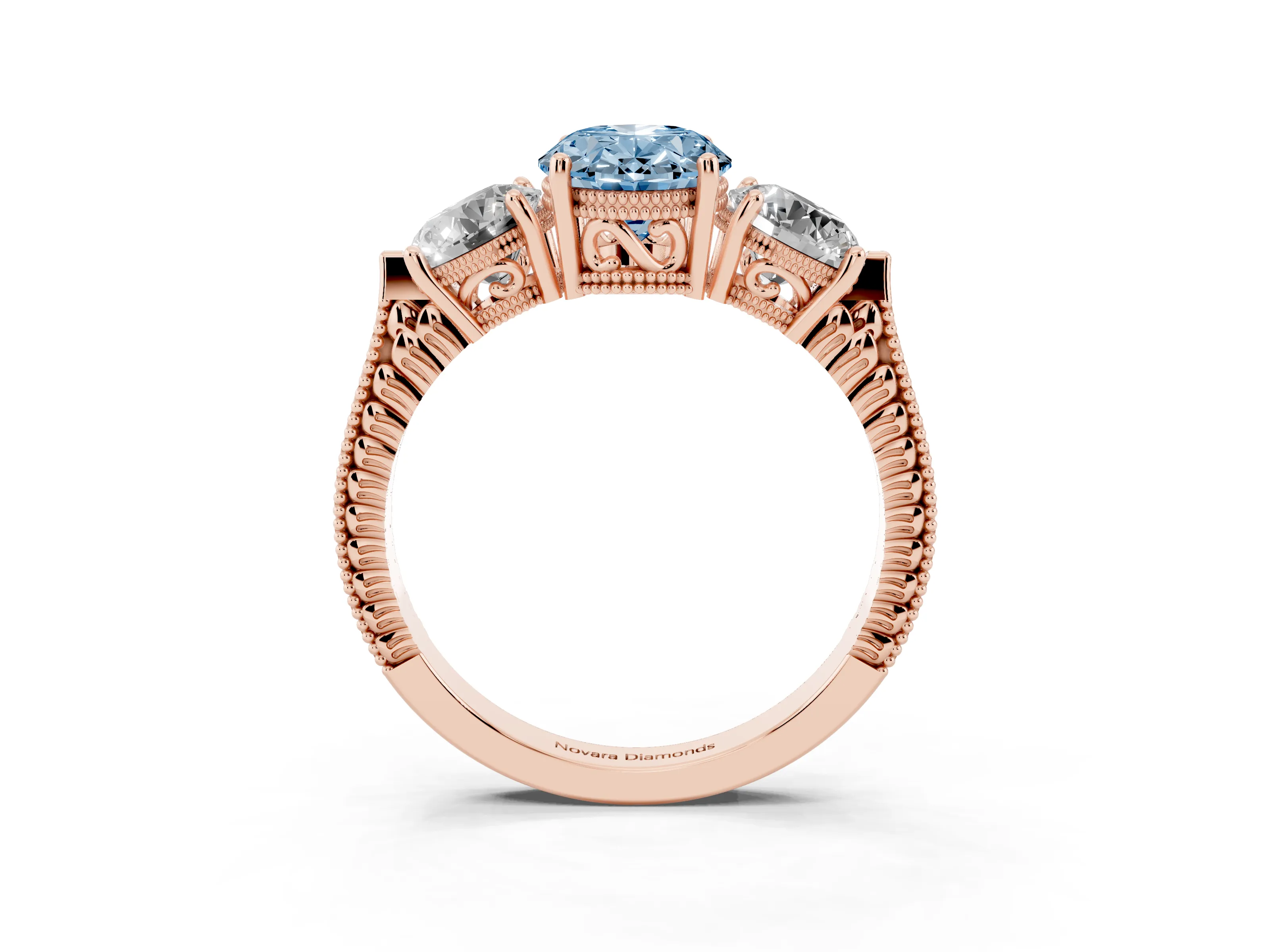 Fancy Blue Oval Cut Diamond Three-Stone Ring Set in Rose gold with Milgrain Band