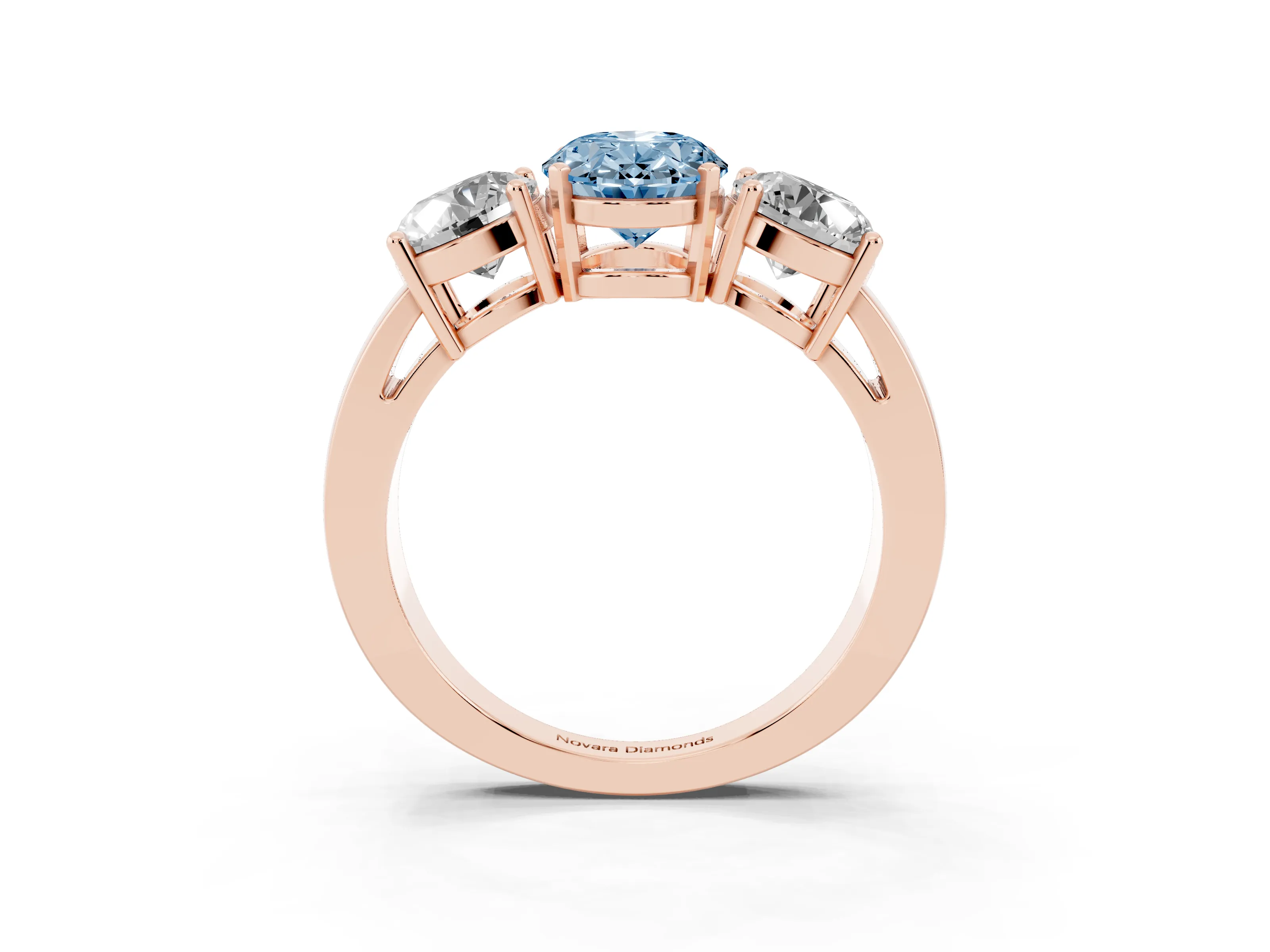 Fancy Blue Oval Cut Diamond Three-Stone Ring Set in Rose gold with Round Side Stones and Classic Band