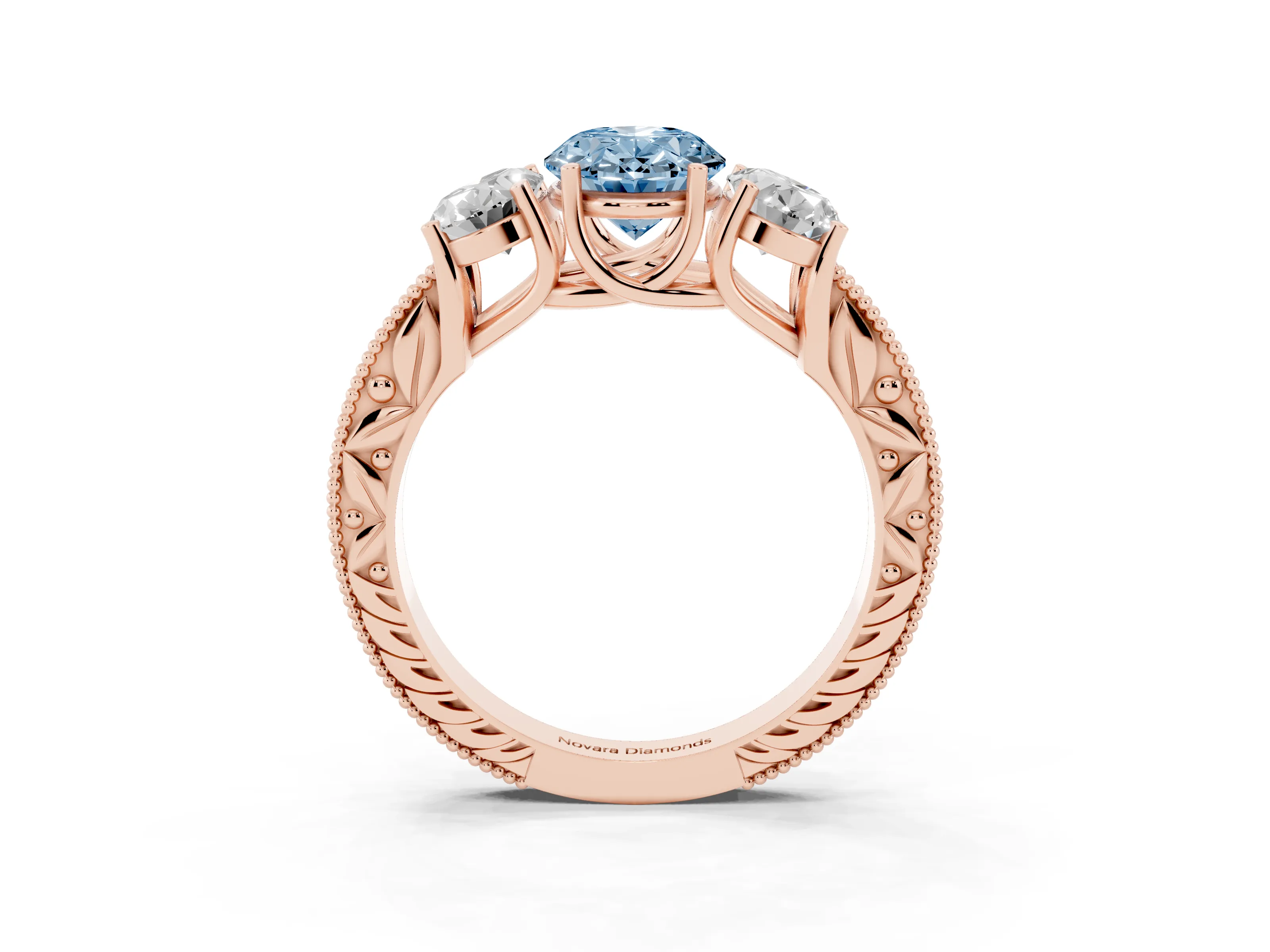 Fancy Blue Oval Cut Diamond Three-Stone Engagement Ring Set in Rose gold with Milgrain Pavé Band