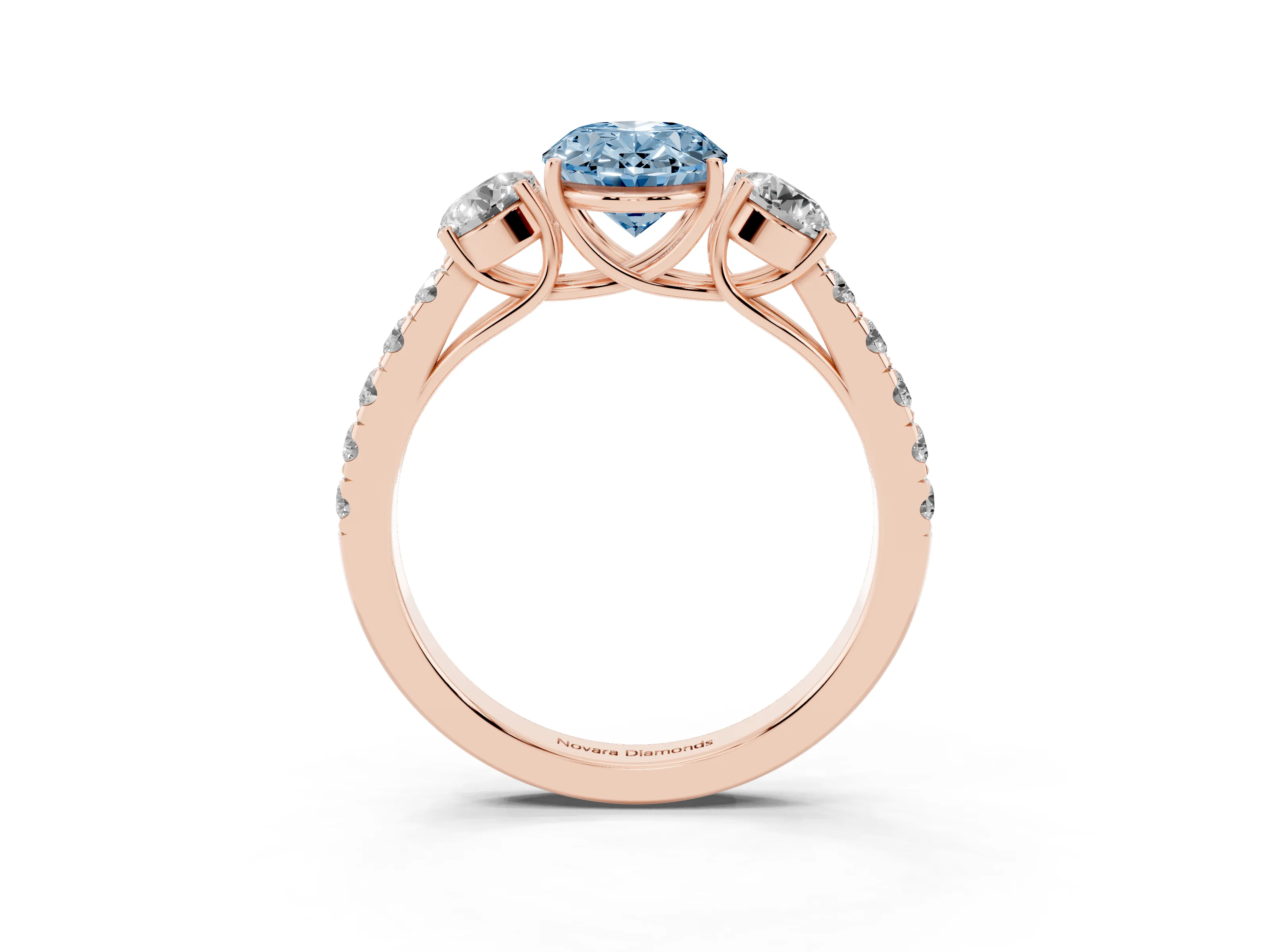Fancy Blue Oval Cut Diamond Three-Stone Ring Set in Rose gold with Round Side Stones and Delicate Pavé Band