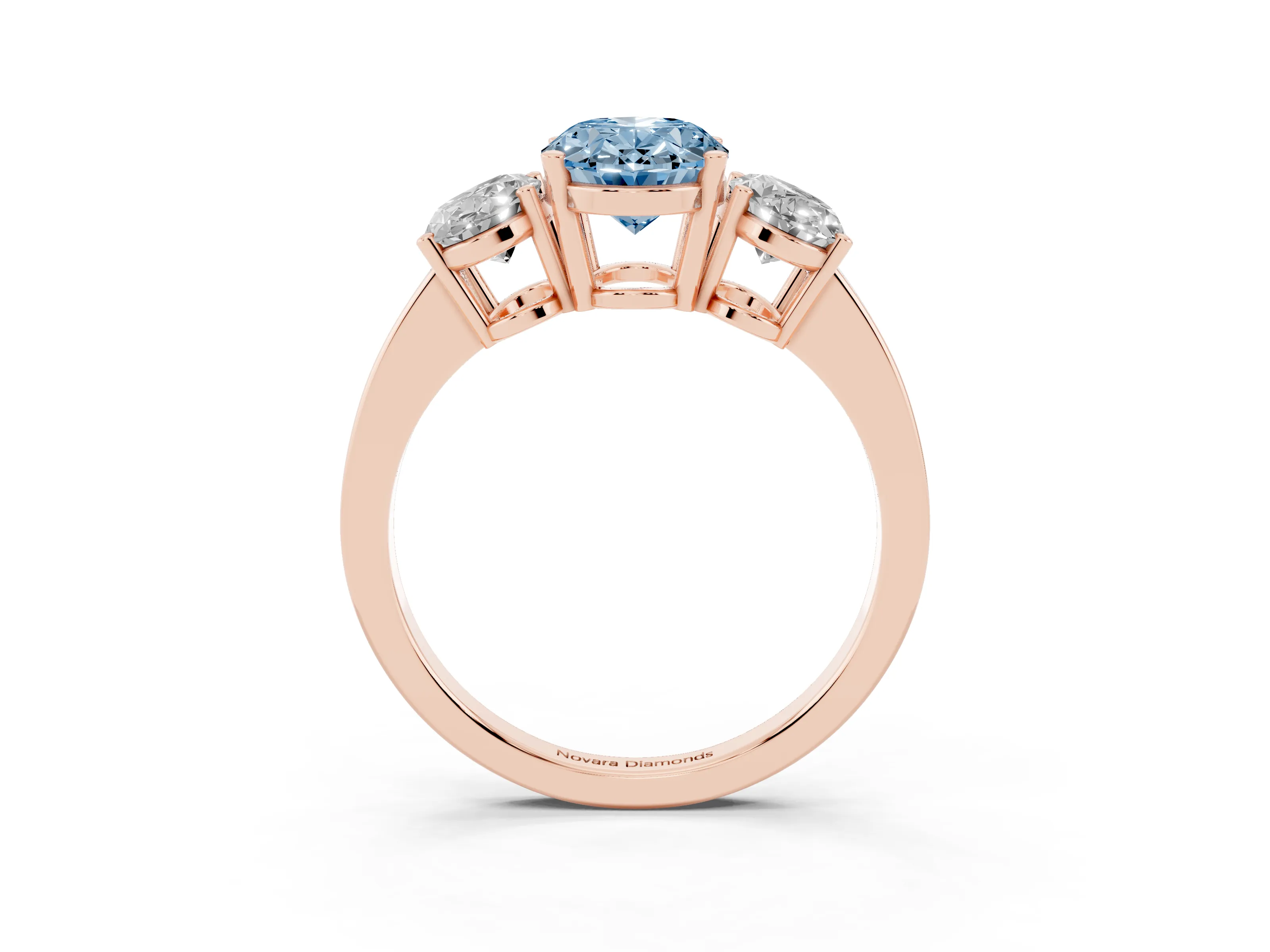 Fancy Blue Oval Cut Diamond Three-Stone Engagement Ring Set in Rose gold with Flat Band