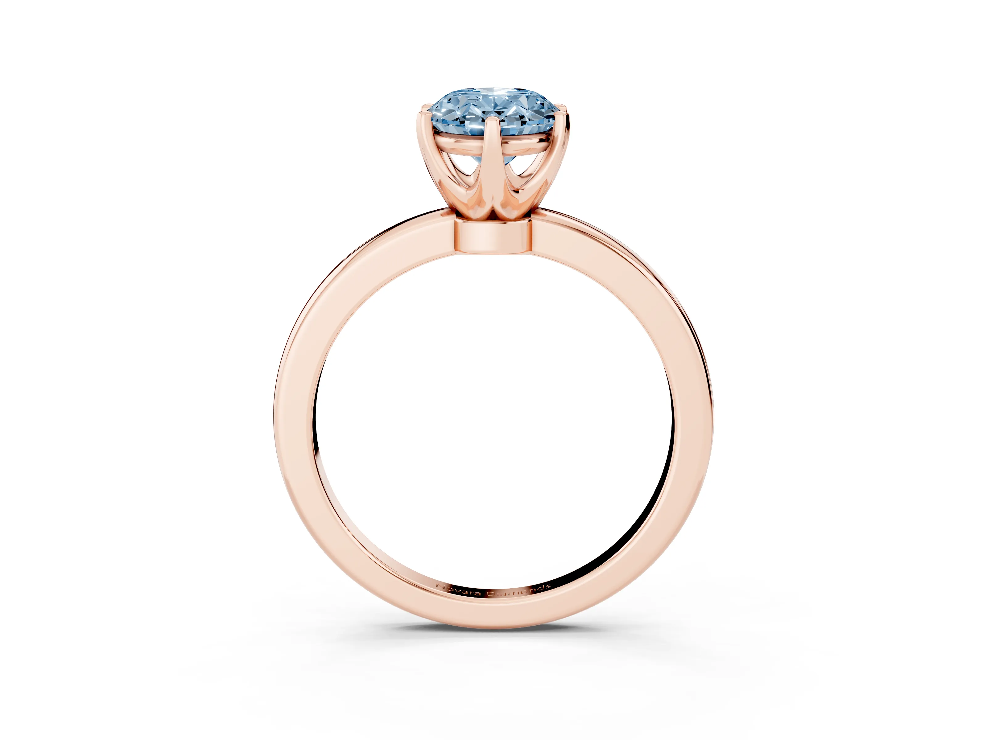Fancy Blue Oval Cut Diamond Solitaire Ring Set in Rose gold with Raised Prong Setting on a Classic Band