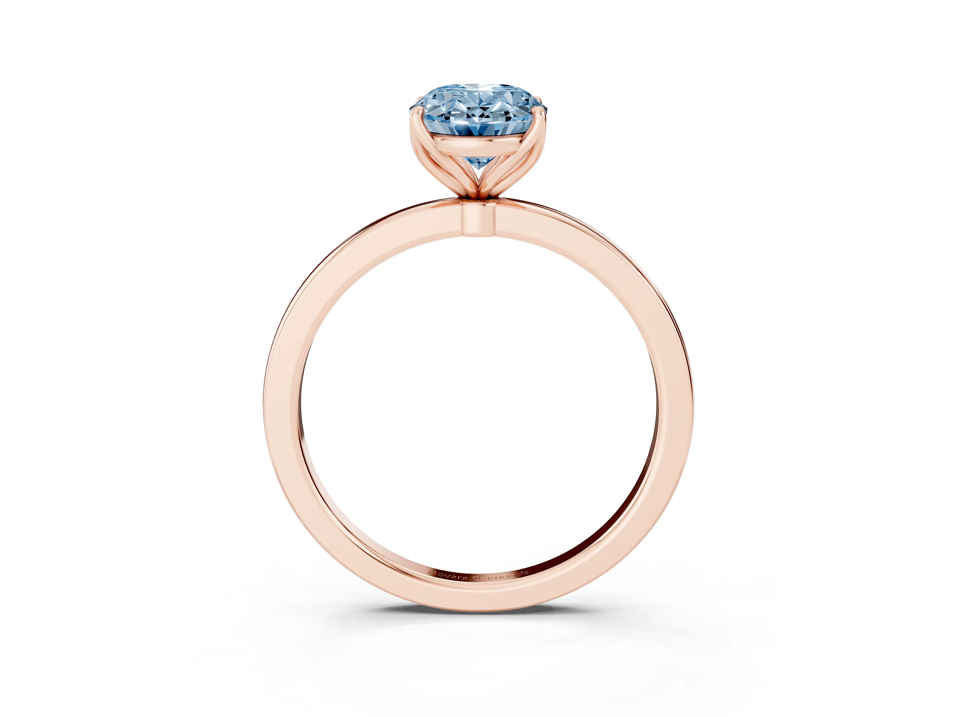 Fancy Blue Oval Cut Diamond Solitaire Ring Set in Rose gold with Prong Setting and Thin Polished Band