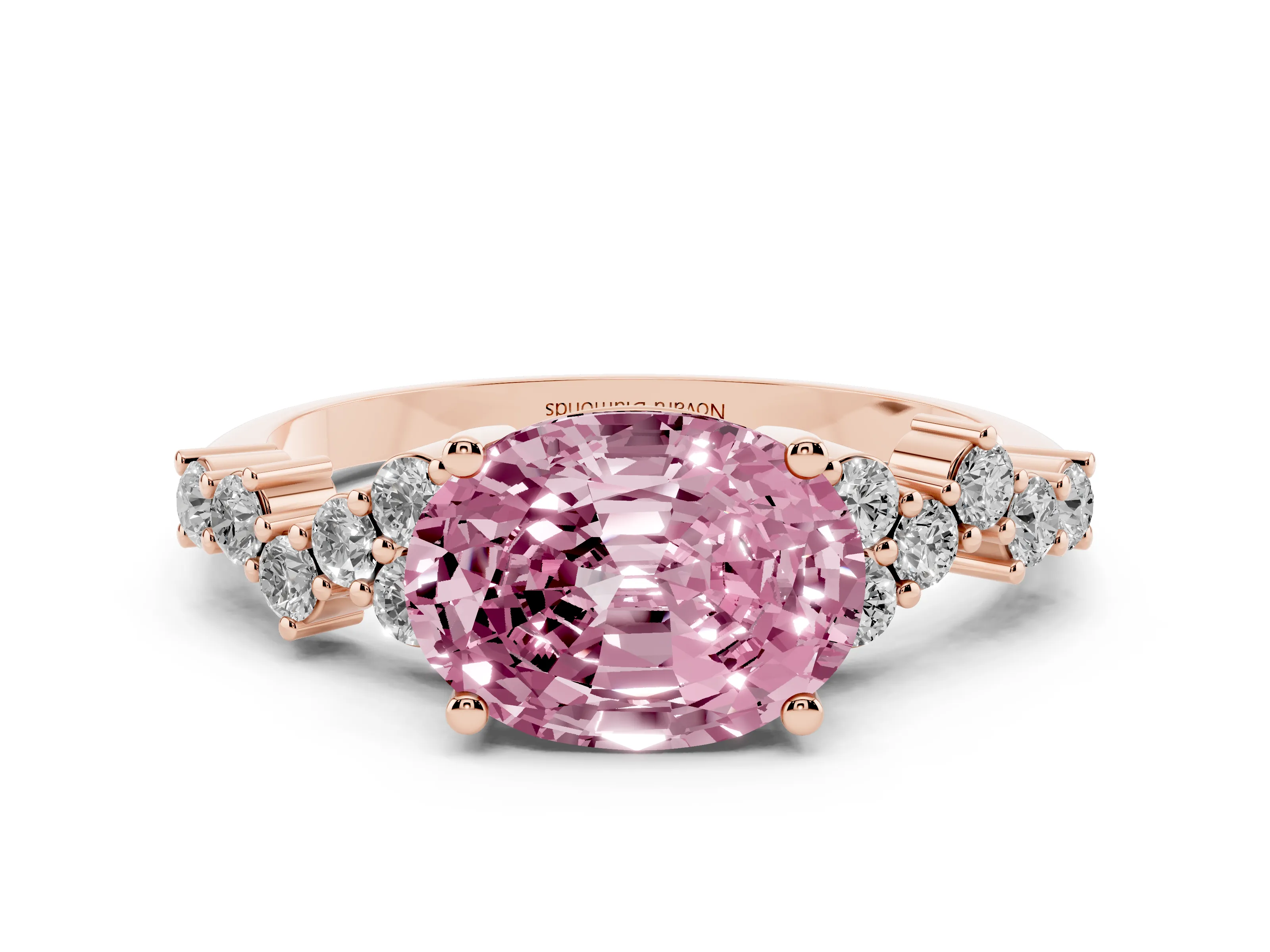 Fancy Pink Oval Cut Diamond Ring Set in Rose gold with Scattered Round Accents