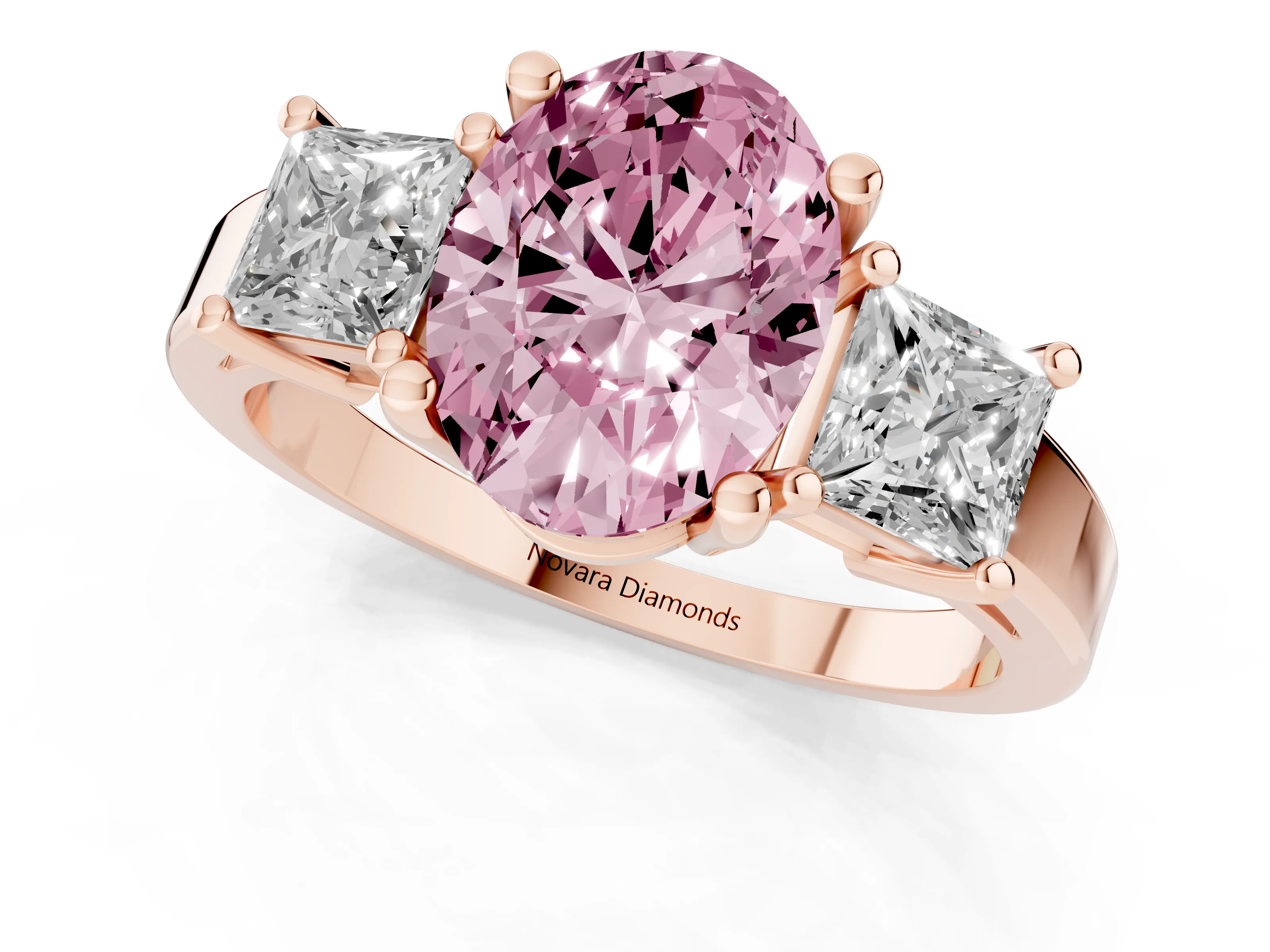 Fancy Pink Three-Stone Oval Cut Diamond Solitaire Ring Set in Rose gold with Prong Setting