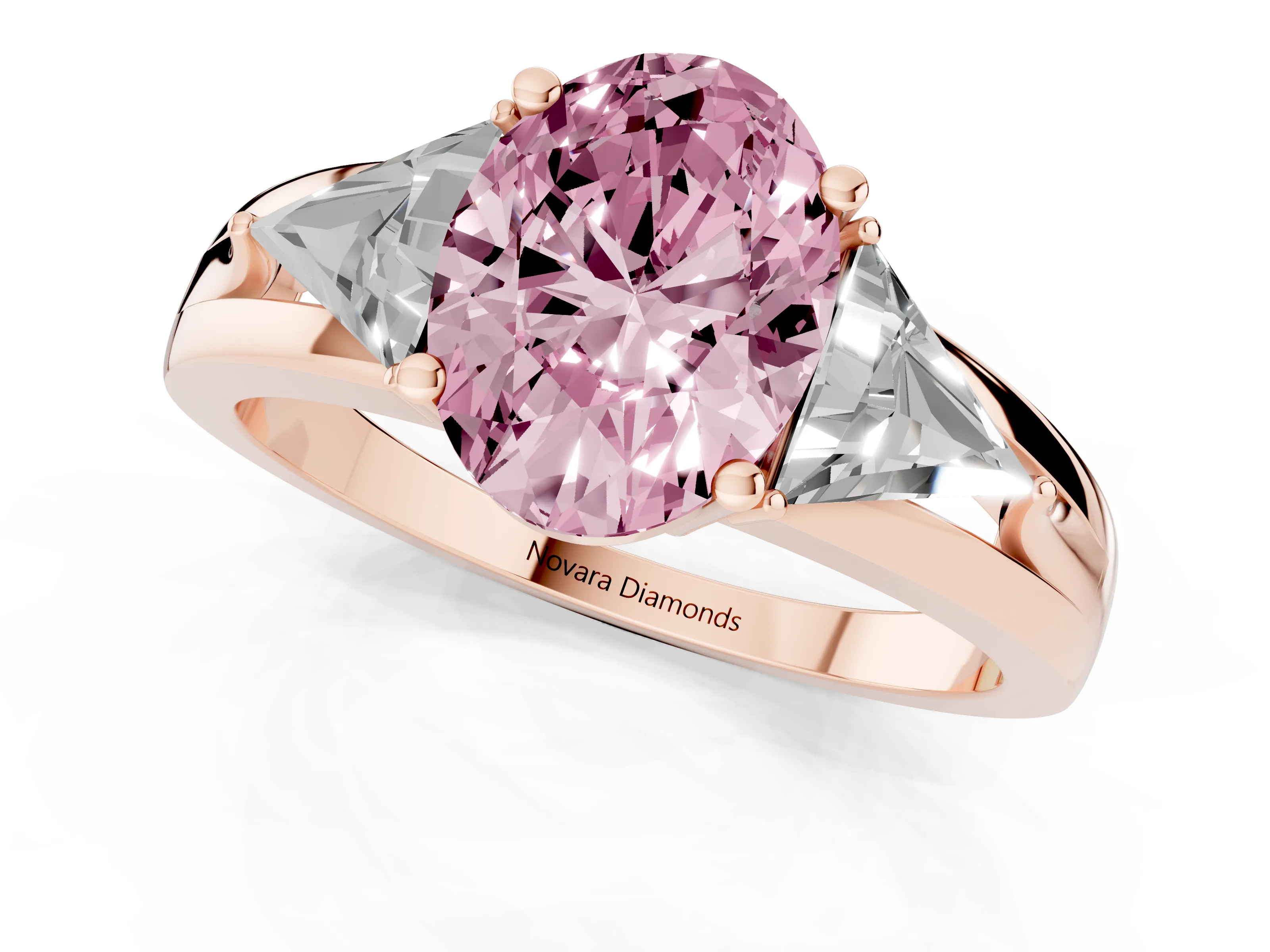 Fancy Pink Oval Cut Diamond Three-Stone Ring Set in Rose gold with Trillion Side Stones and Split Shank