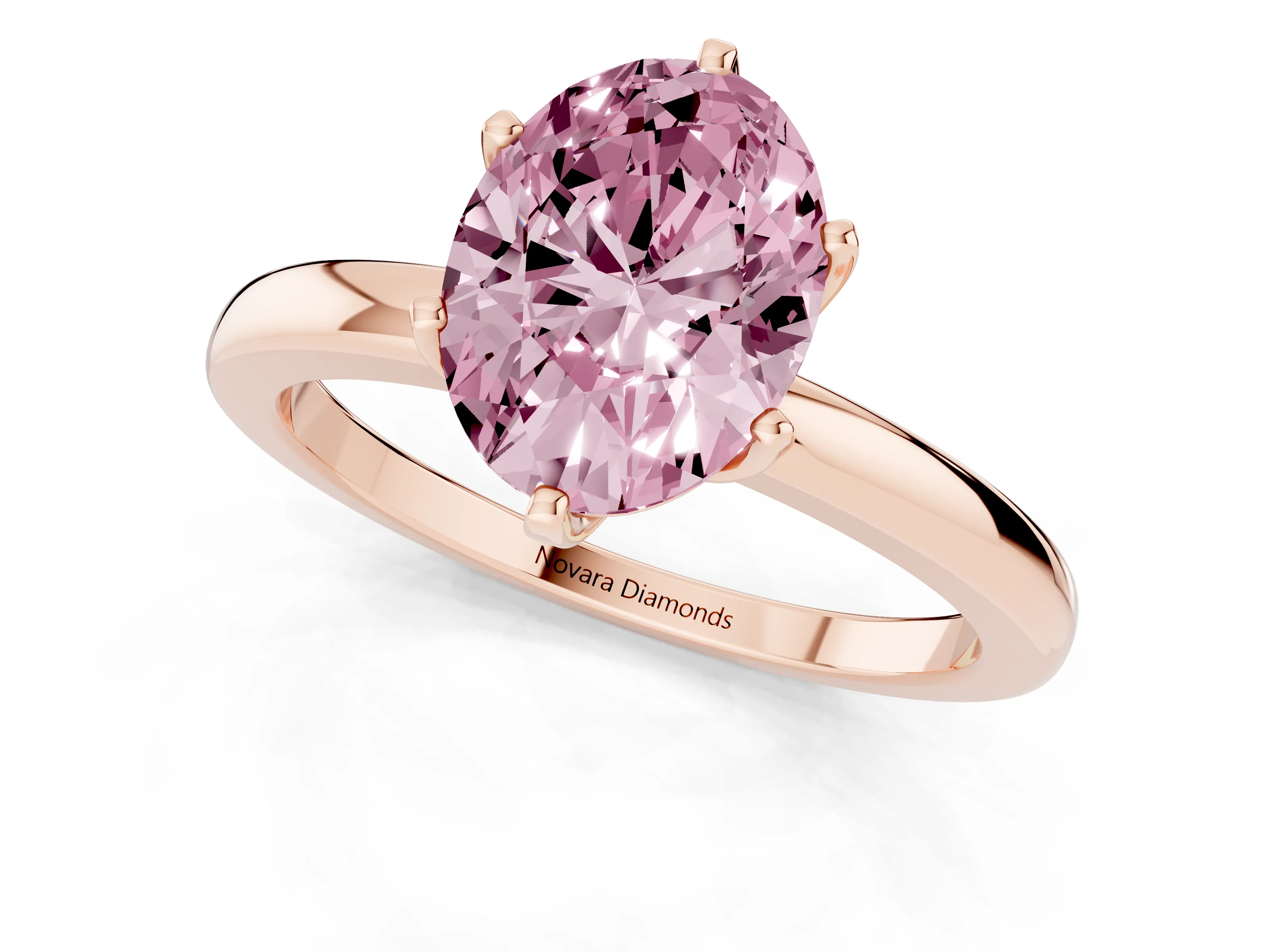 Fancy Pink Oval Cut Diamond Solitaire Ring Set in Rose gold with Raised Prong Setting on a Classic Band