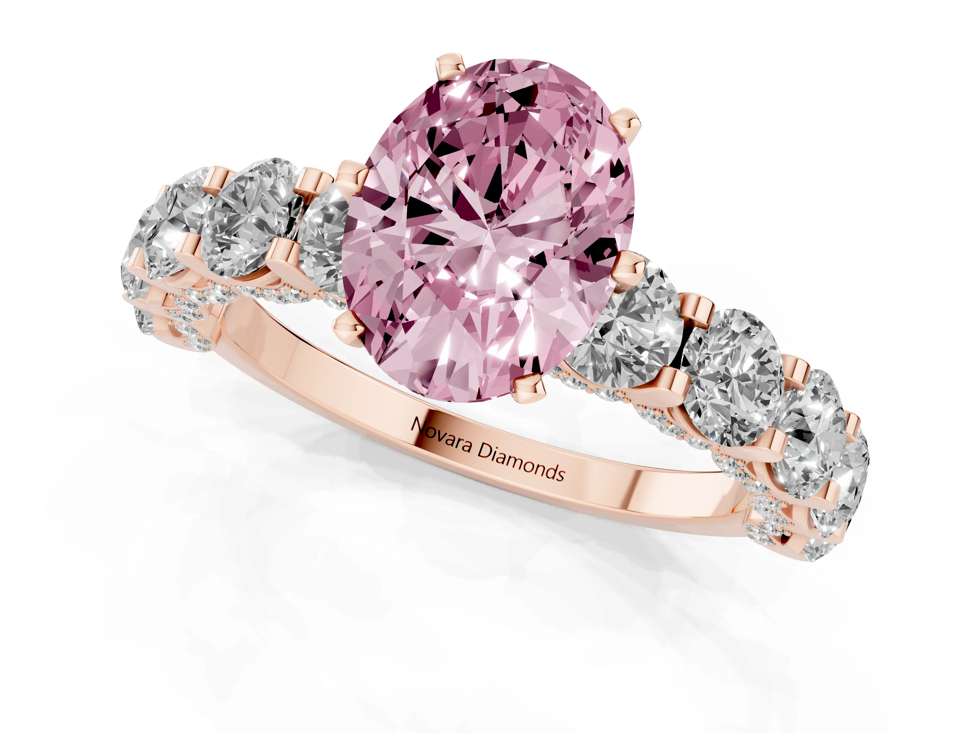 Fancy Pink Oval Cut Diamond Side Stone Ring Set in Rose gold with Alternating Round and Oval Side Stones