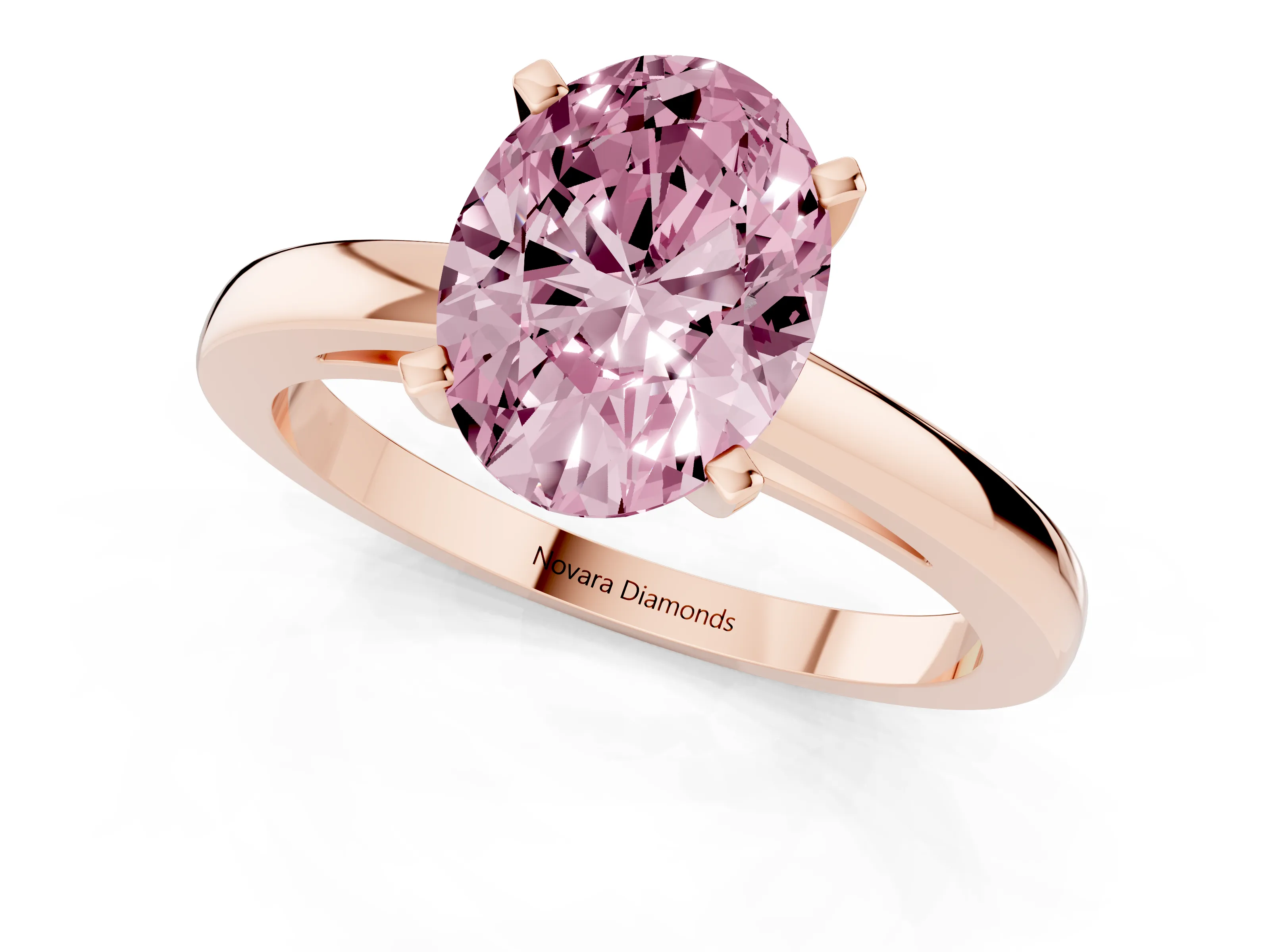 Fancy Pink Oval Cut Diamond Solitaire Engagement Ring Set in Rose gold with Prong Setting on a Classic Band