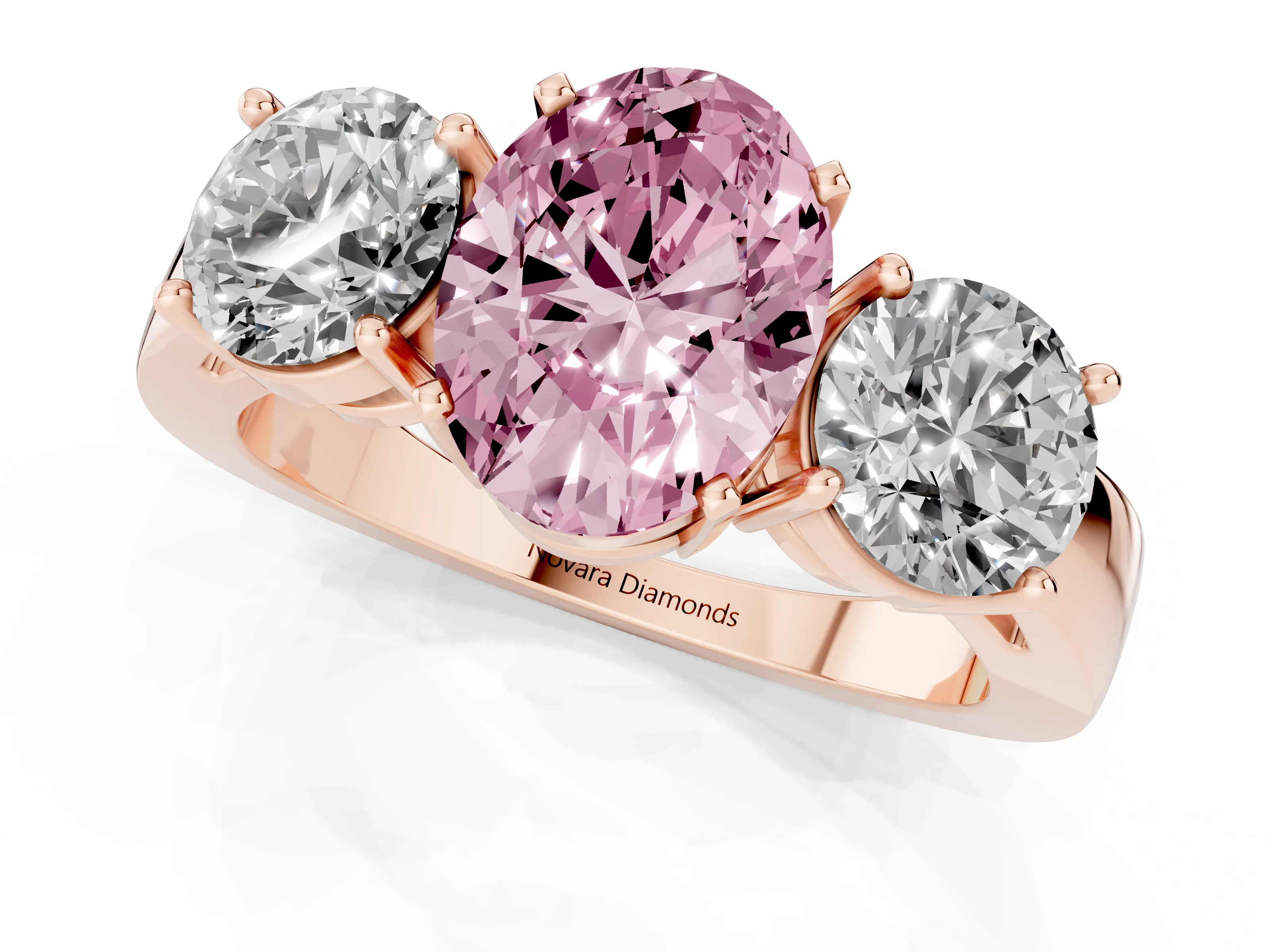Fancy Pink Oval Cut Diamond Three-Stone Ring Set in Rose gold with Round Side Stones and Classic Band – second view