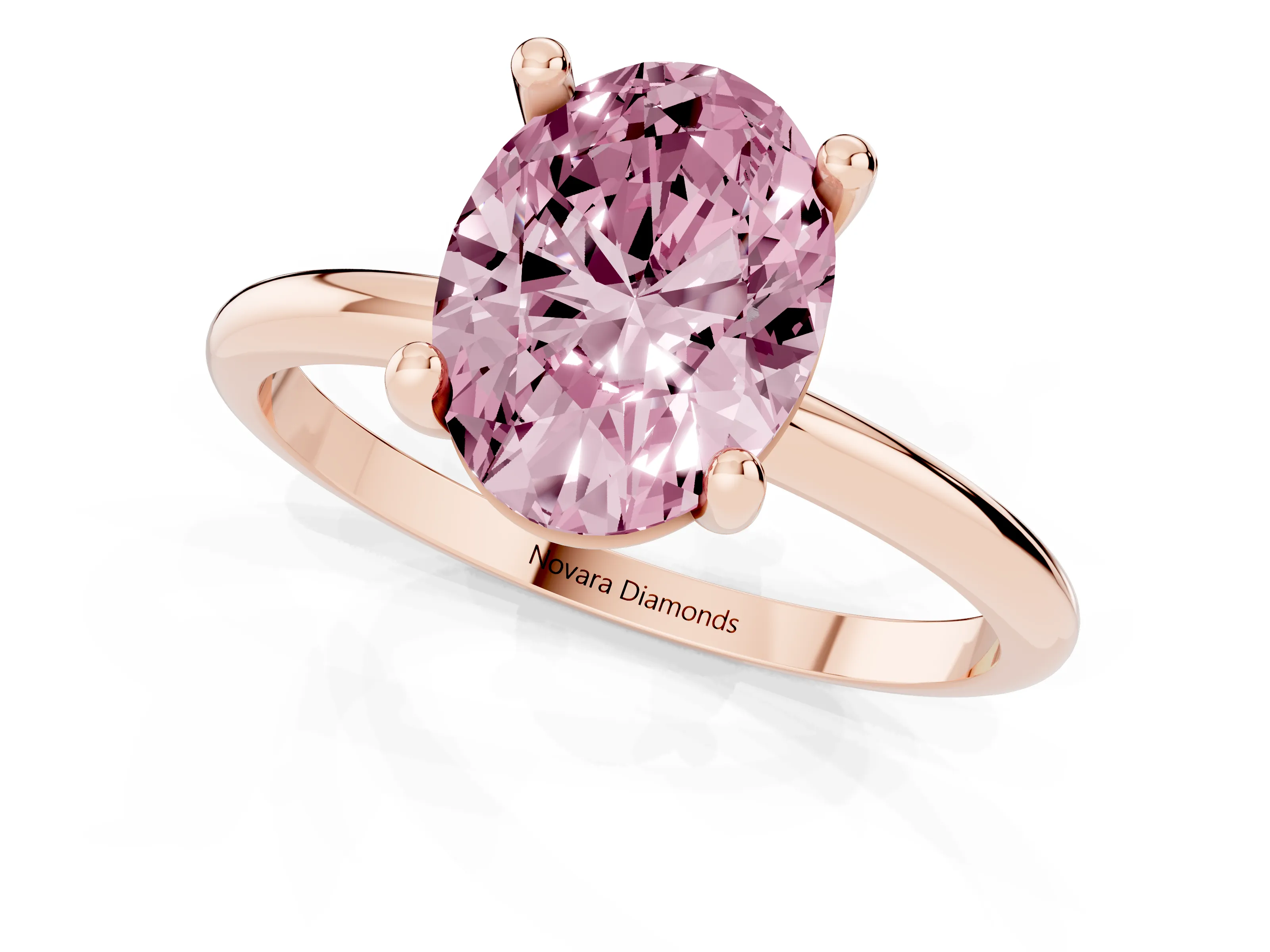Fancy Pink Oval Cut Diamond Solitaire Ring Set in Rose gold with Secure Prong Setting on a Classic Band