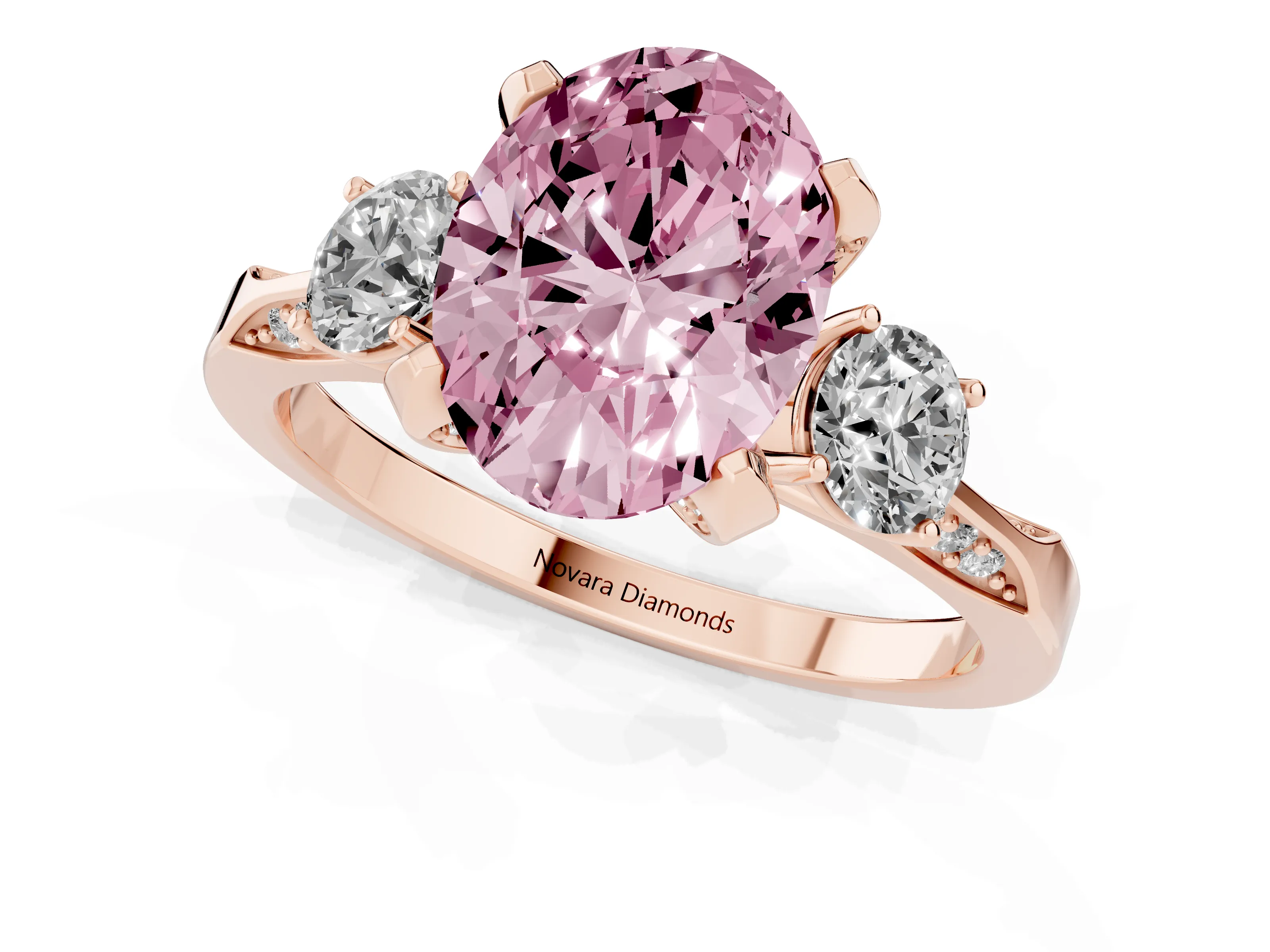 Fancy Pink Oval Cut Diamond Three-Stone Ring Set in Rose gold with Pavé Band and Smaller Side Stones