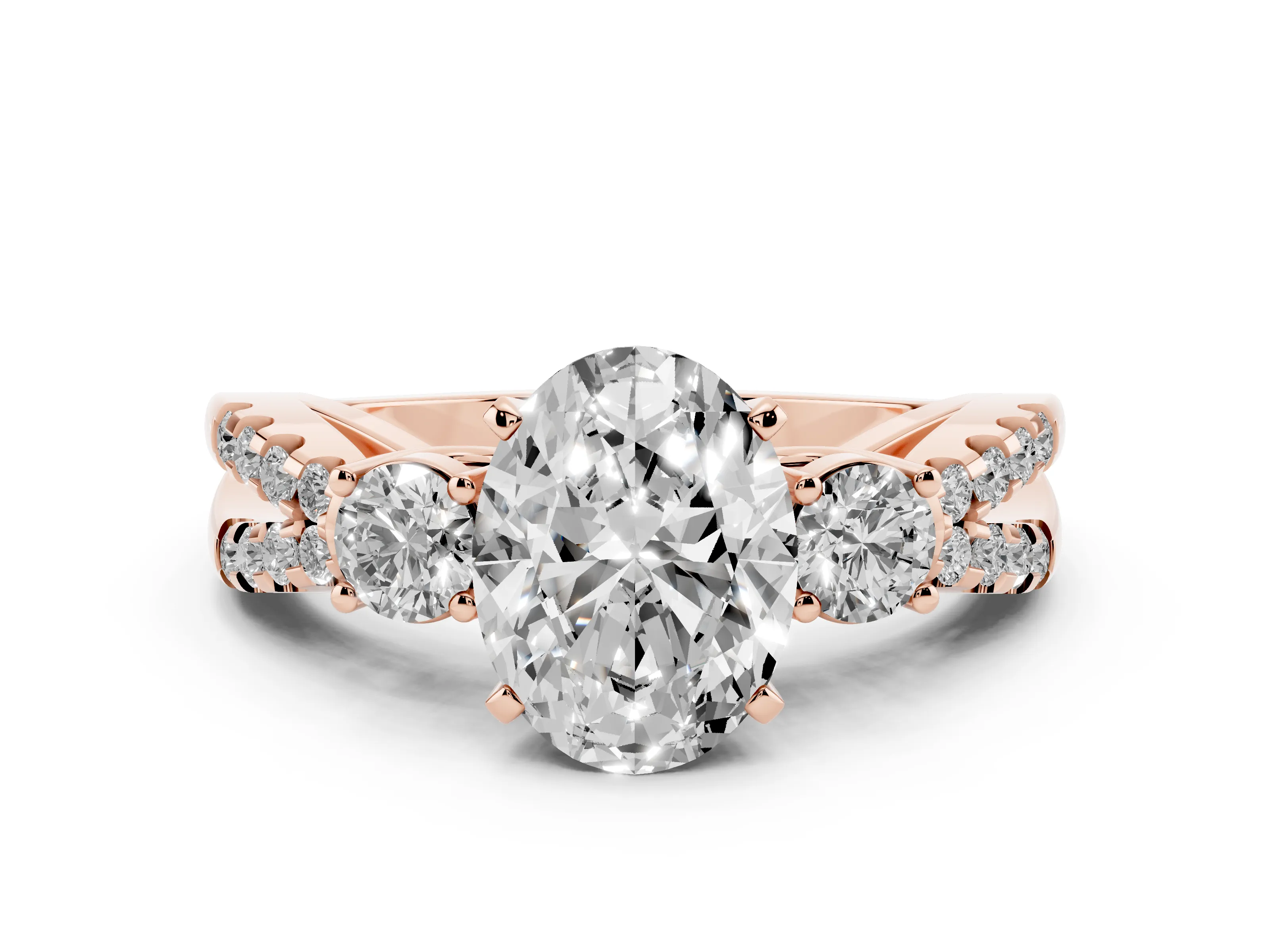 Oval Cut Diamond Three-Stone Ring Set in Rose gold with Pavé Split Shank and Prong Setting