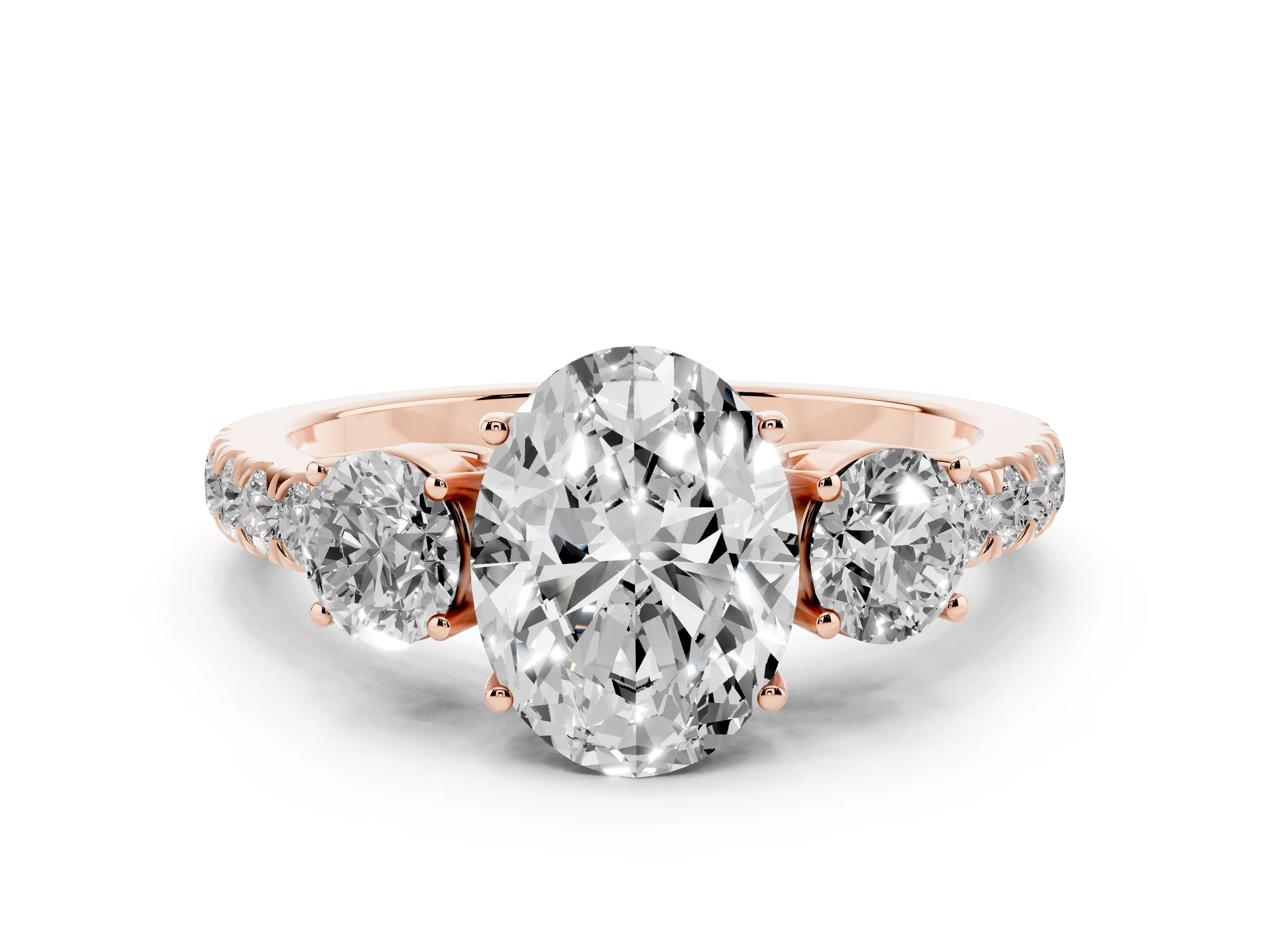 Oval Cut Diamond Three-Stone Ring Set in Rose gold with Round Side Stones and Delicate Pavé Band