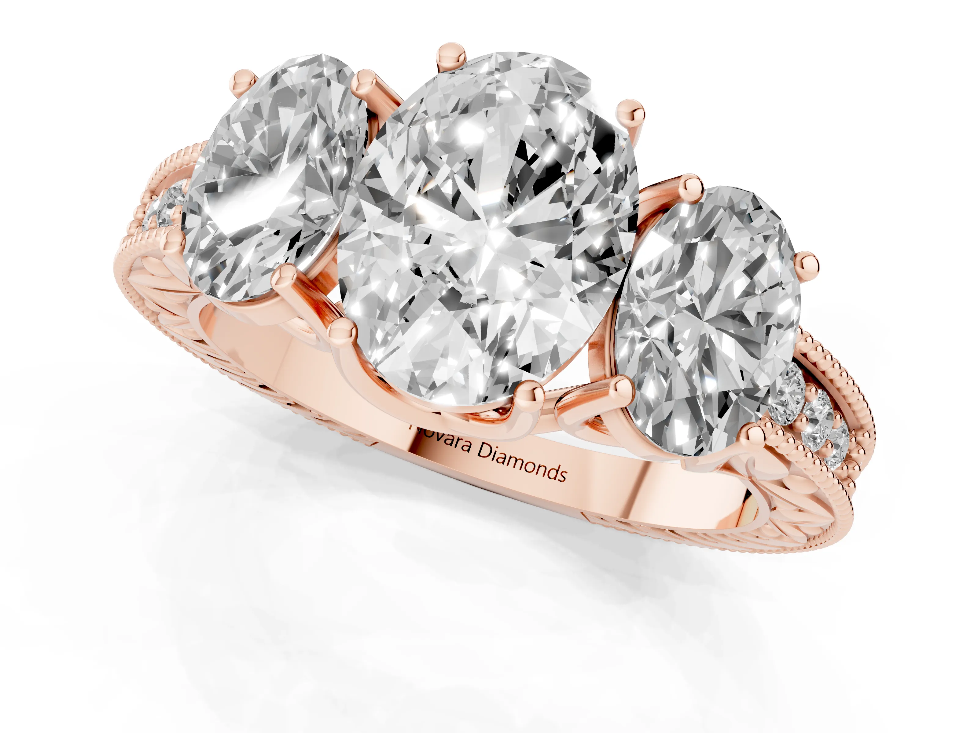 Oval Cut Diamond Three-Stone Engagement Ring Set in Rose gold with Milgrain Pavé Band