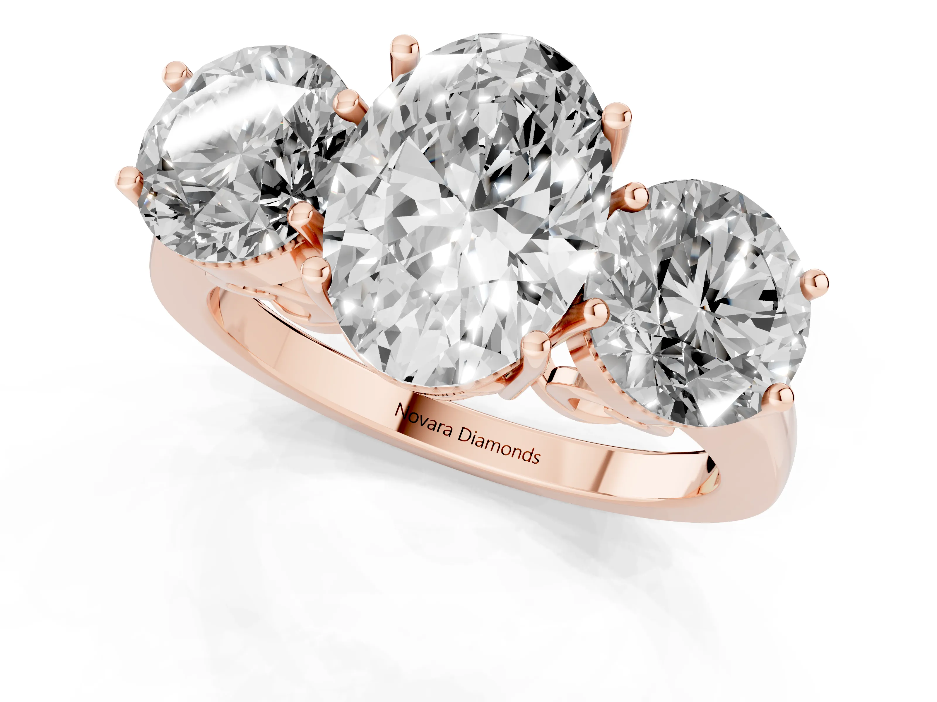 Oval Cut Diamond Three-Stone Engagement Ring Set in Rose gold with Polished Band