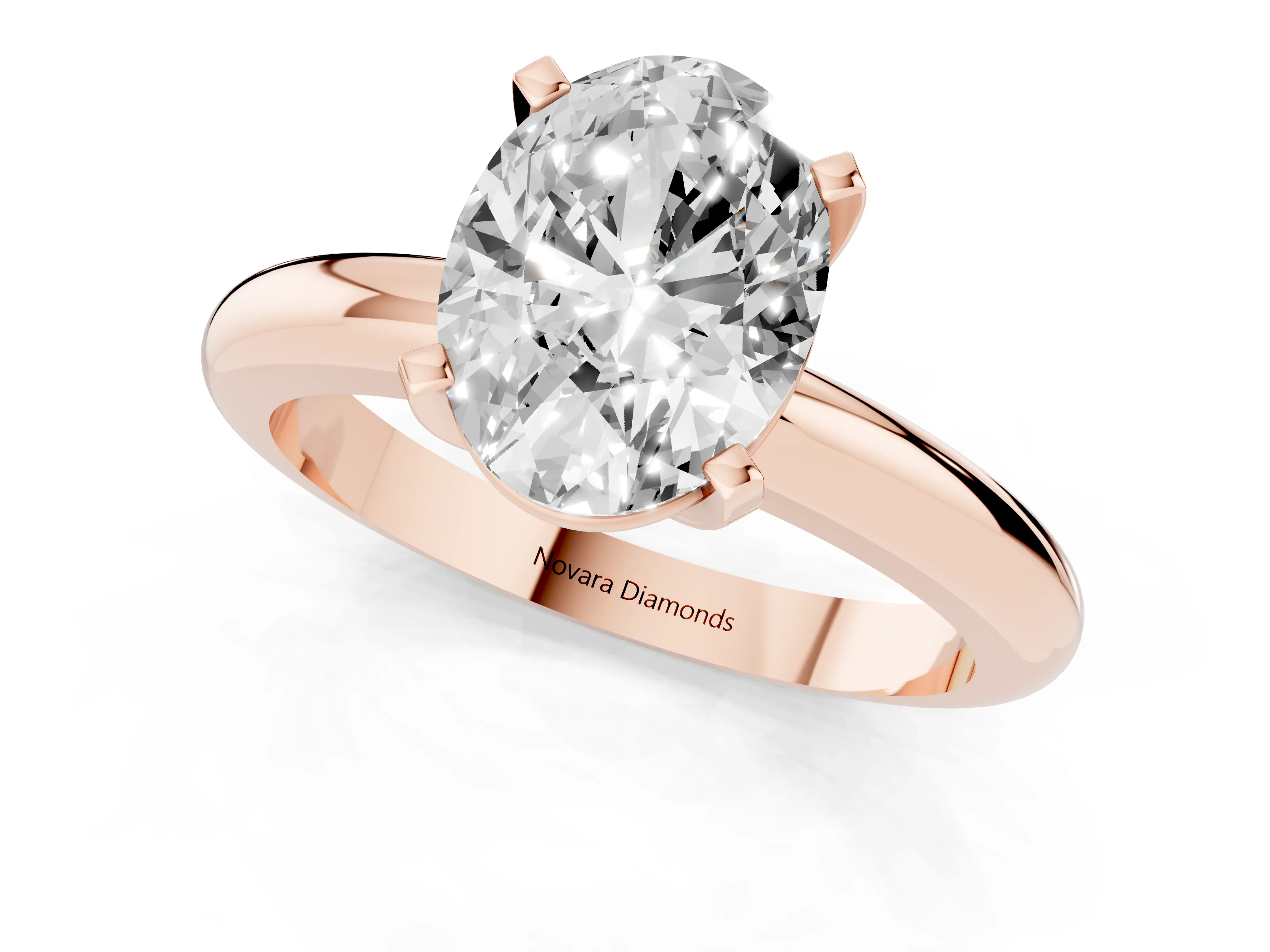Oval Cut Diamond Solitaire Engagement Ring Set in Rose gold with Round Band and Prong Setting