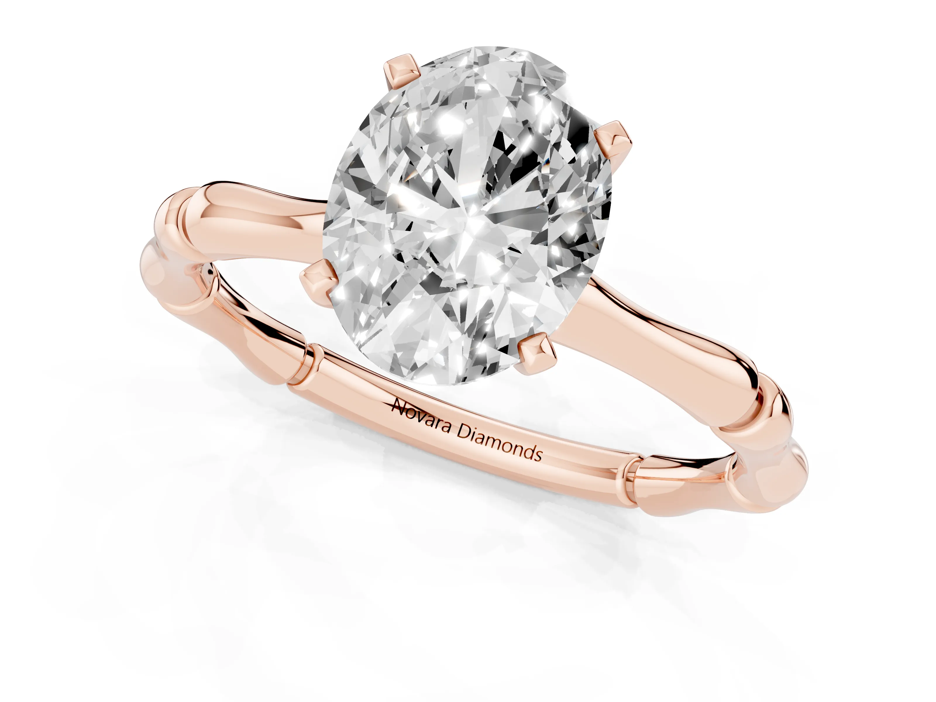 Oval Cut Diamond Solitaire Ring Set in Rose gold with Bamboo Band and Prong Setting