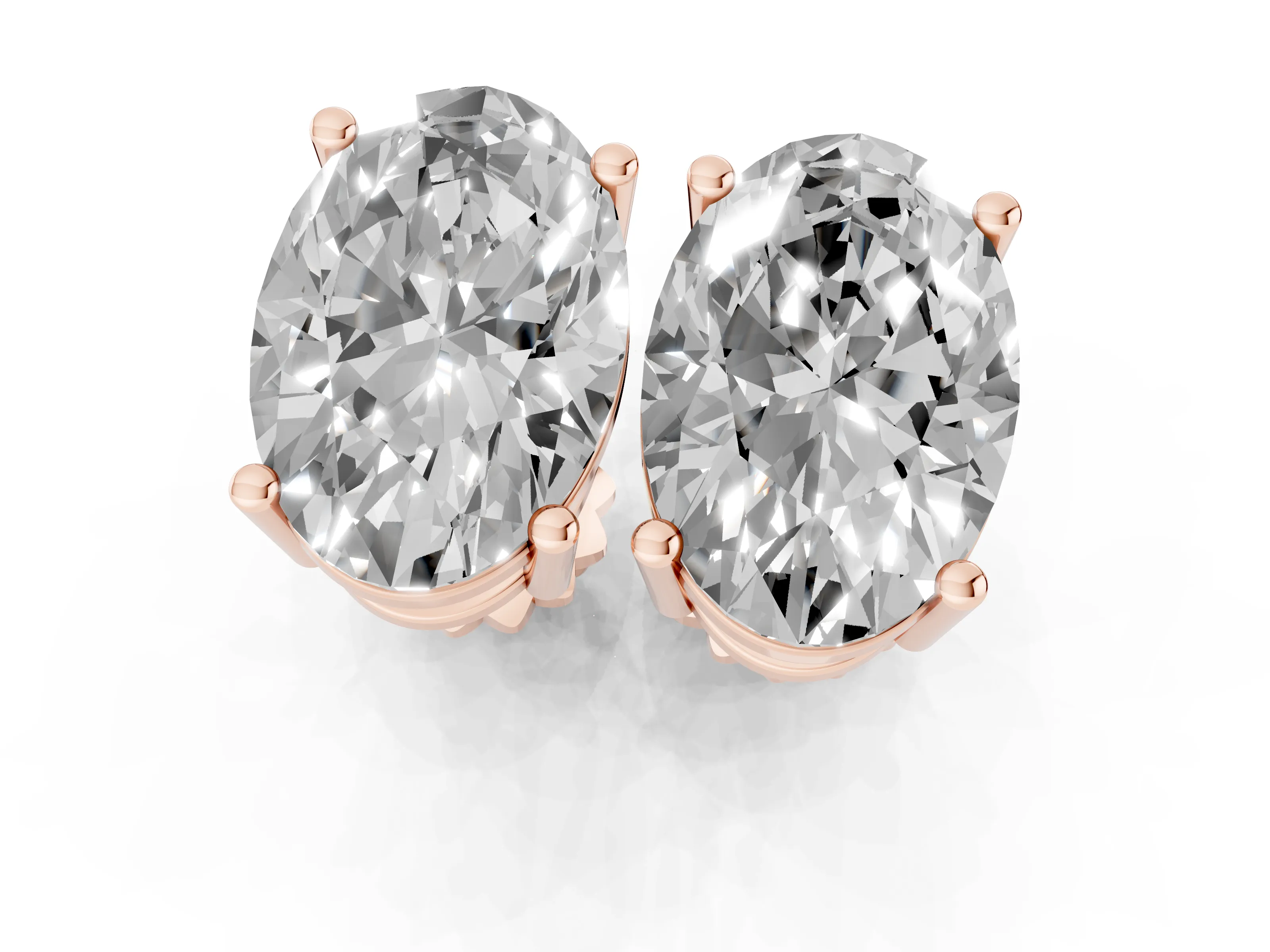 Oval Cut Diamond Solitaire Stud Earrings Set in Rose gold with Basket Setting