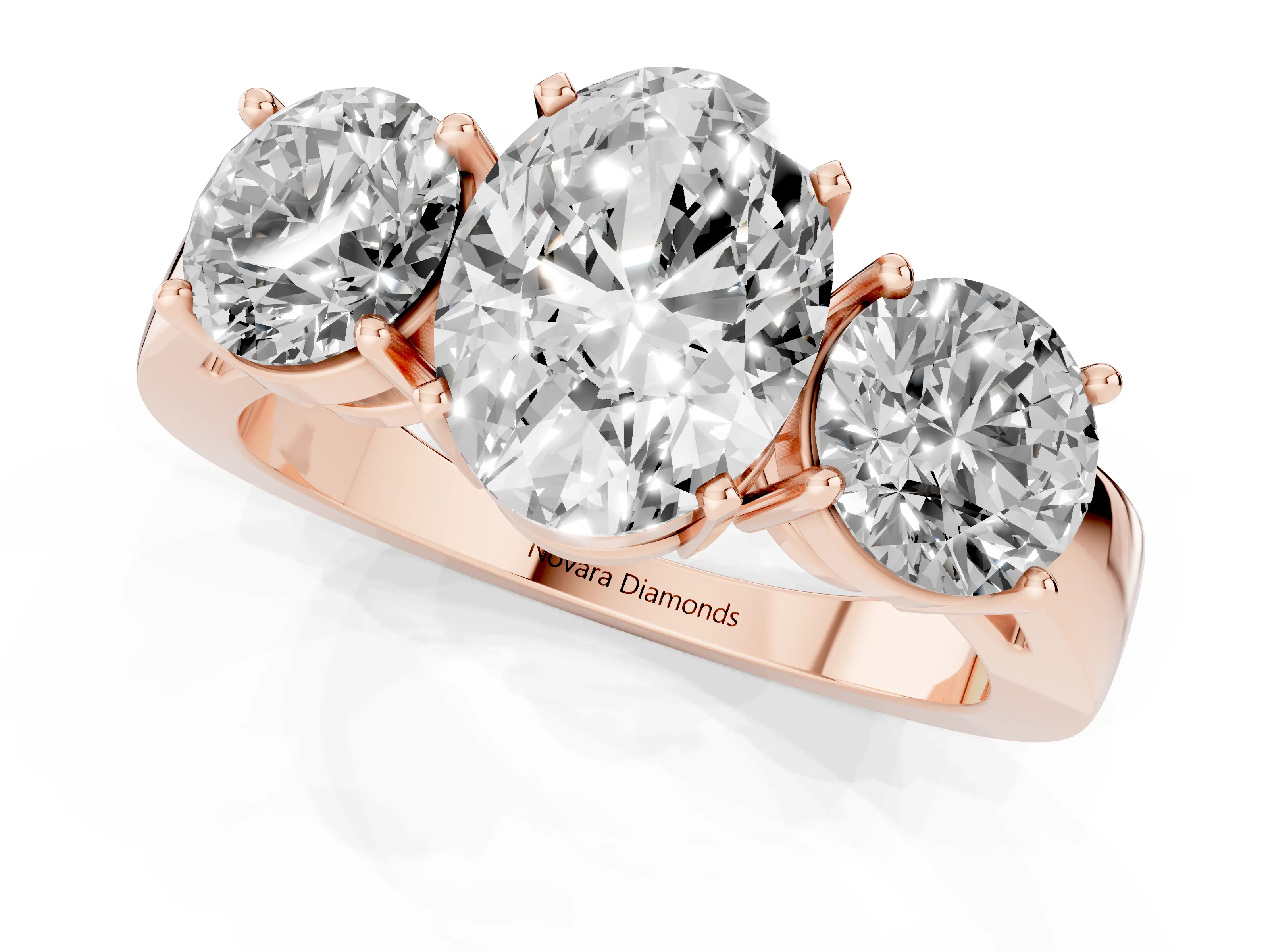 Oval Cut Diamond Three-Stone Ring Set in Rose gold with Round Side Stones and Classic Band