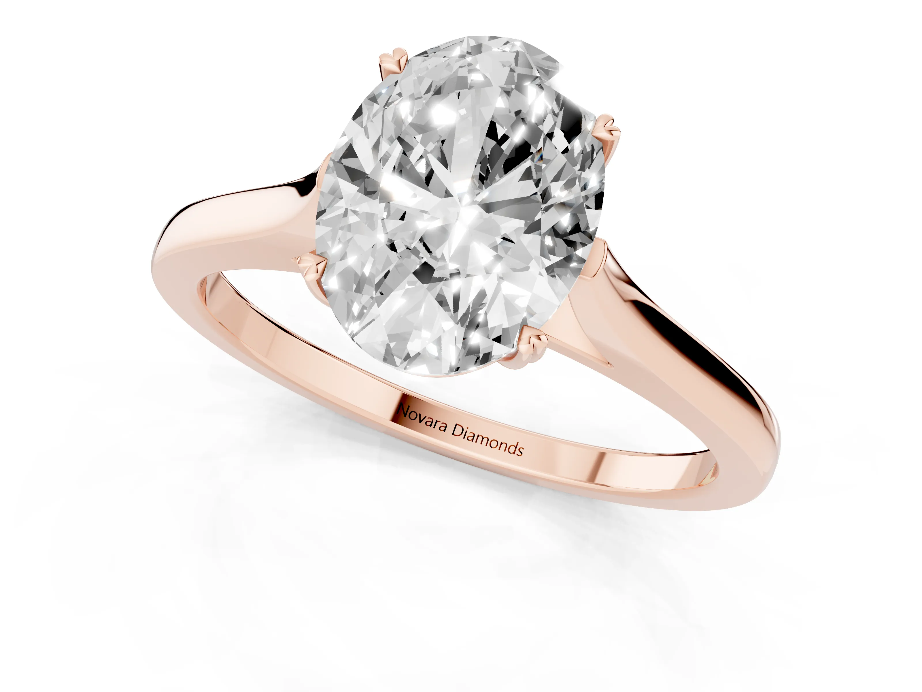 Oval Cut Diamond Solitaire Heart Prong Engagement Ring Set in Rose gold with Tapered Band